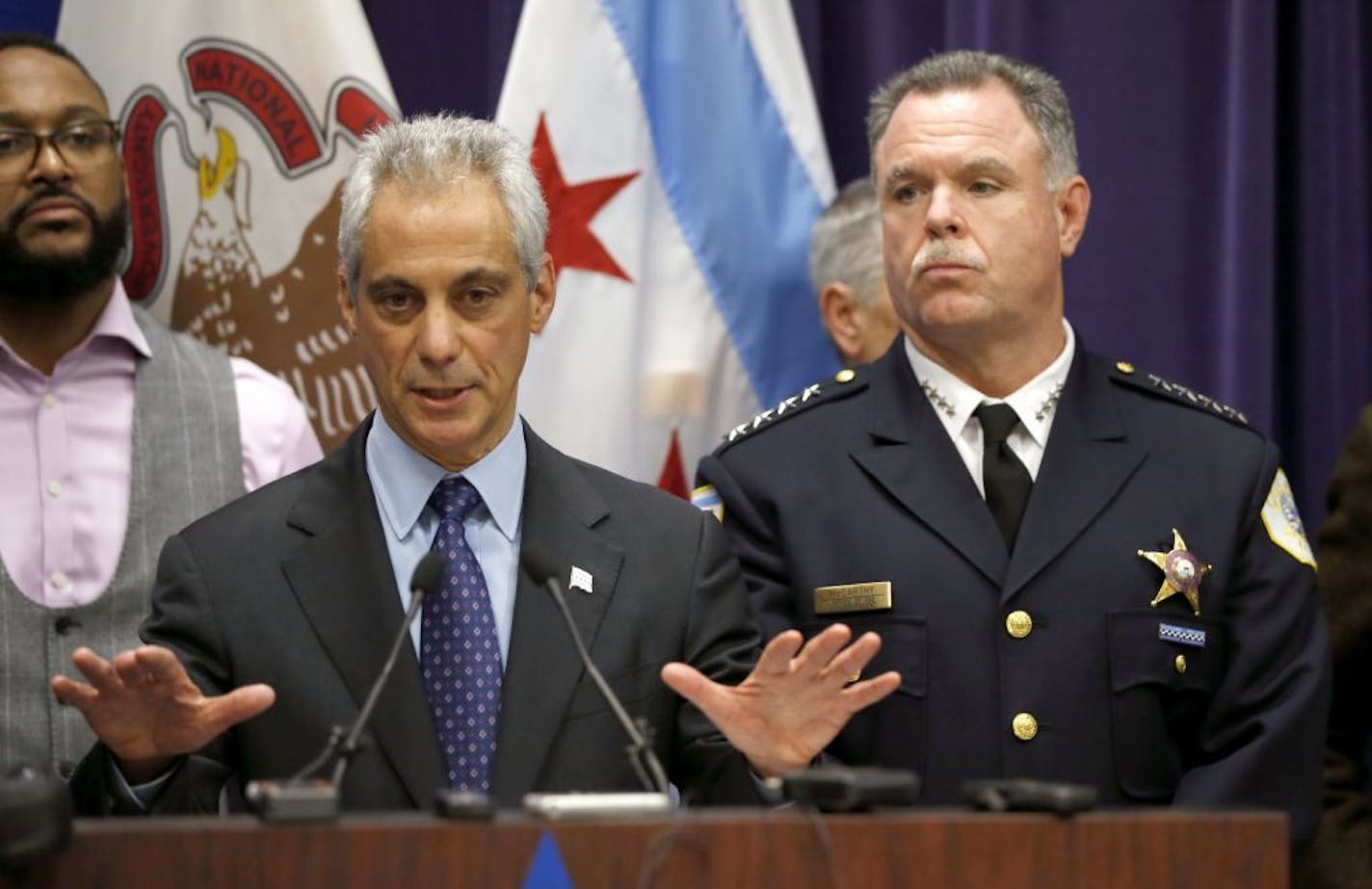 Chicago Mayor Rahm Emanuel, left, and Police Superintendent Garry McCarthy appeared at a news conference, Tuesday, Nov. 24, 2015, in Chicago, announcing first-degree murder charges against police officer Jason Van Dyke in the Oct. 24, death of 17-year-old Laquan McDonald.