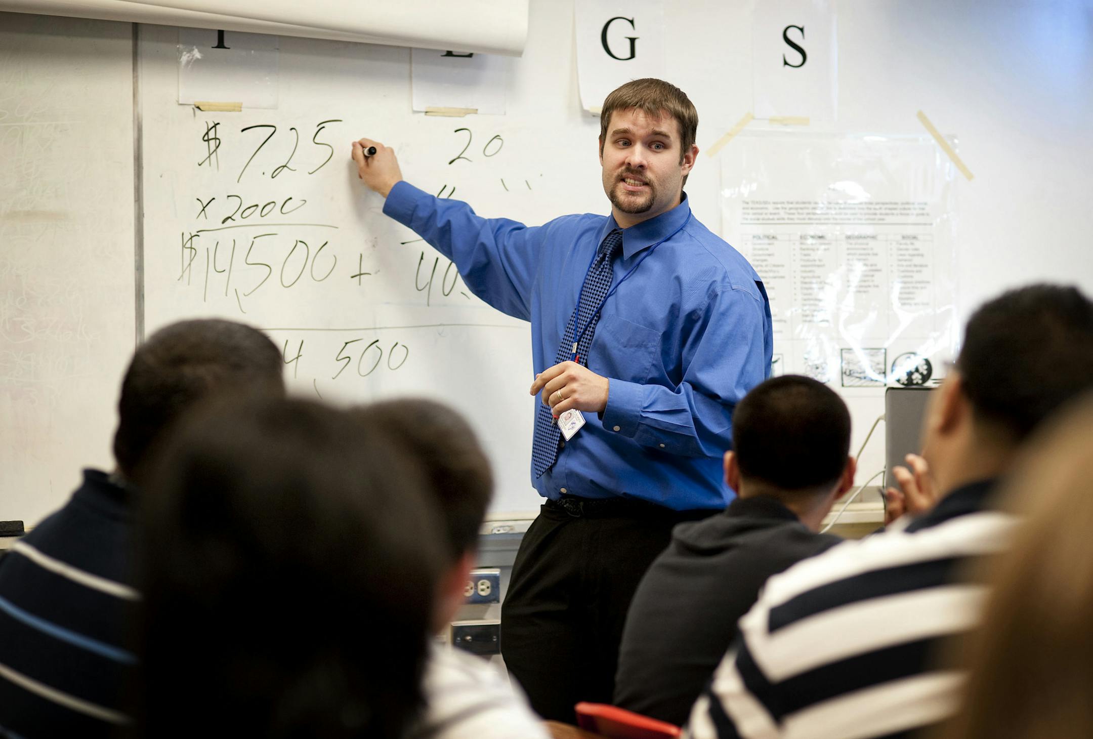 Mathew Frost at Sunset High School in Dallas teaches his students and economics and personal finance on April 8, 2010. While more states are beginning to require personal finance instruction, there aren&#x2019;t enough that do, financial literacy experts say, and the quality is inconsistent. (Matt Nager/The New York Times) ORG XMIT: NYT78
