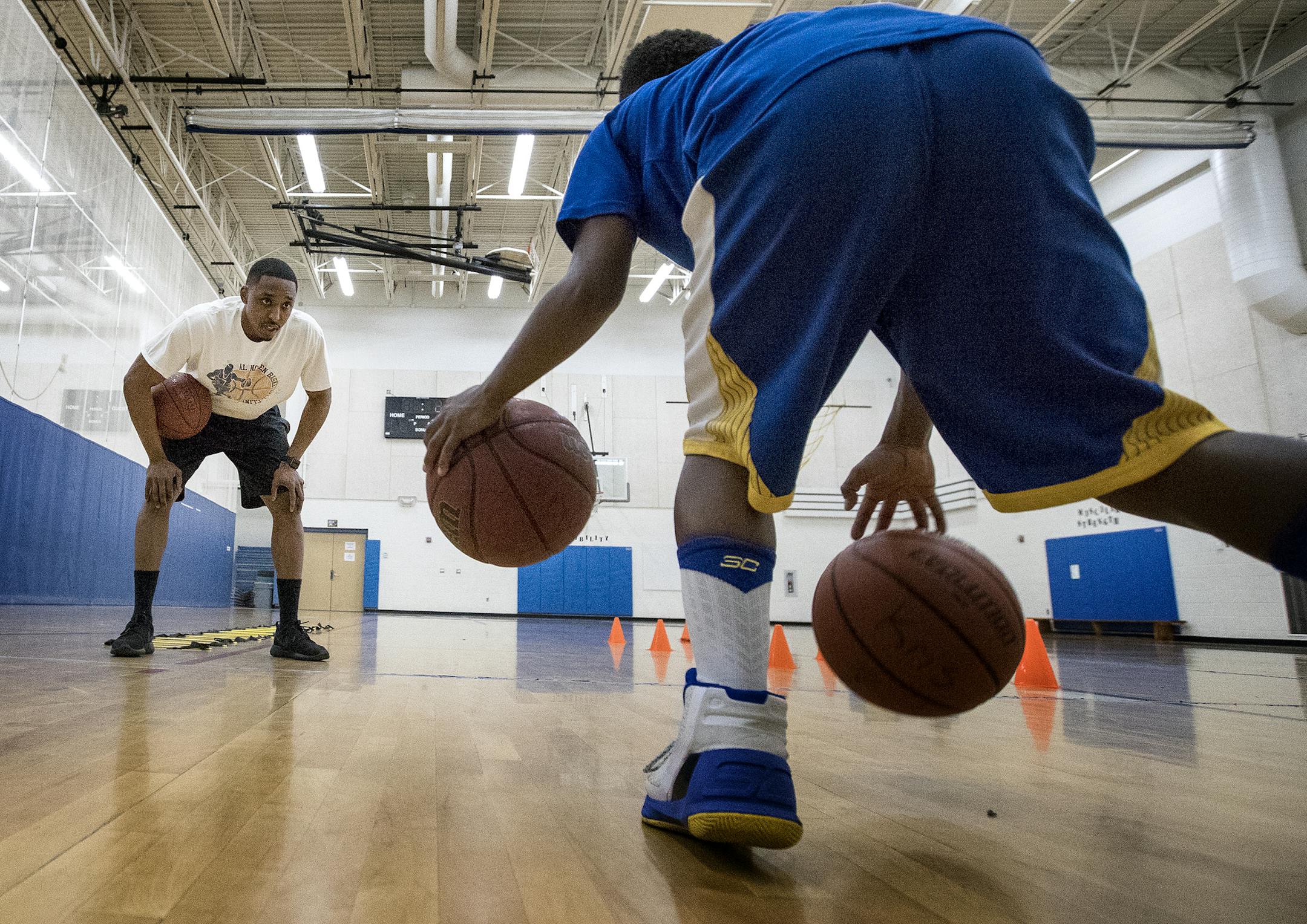 Kristian Baker, 10, trained during a private lesson with former Gophers point guard Al Nolen at the Davis Community Center in Golden Valley.