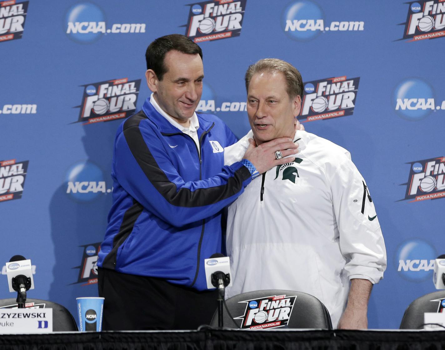 Duke head coach Mike Krzyzewski and Michigan State head coach Tom Izzo have some fun before a news conference for the NCAA Final Four tournament college basketball semifinal game Thursday, April 2, 2015, in Indianapolis. (AP Photo/Darron Cummings) ORG XMIT: FF130