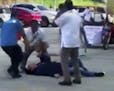 In this image made from video, Philippines Mayor Antonio Halili is seen on the ground after being shot during a flag-raising ceremony, Monday, July 2,