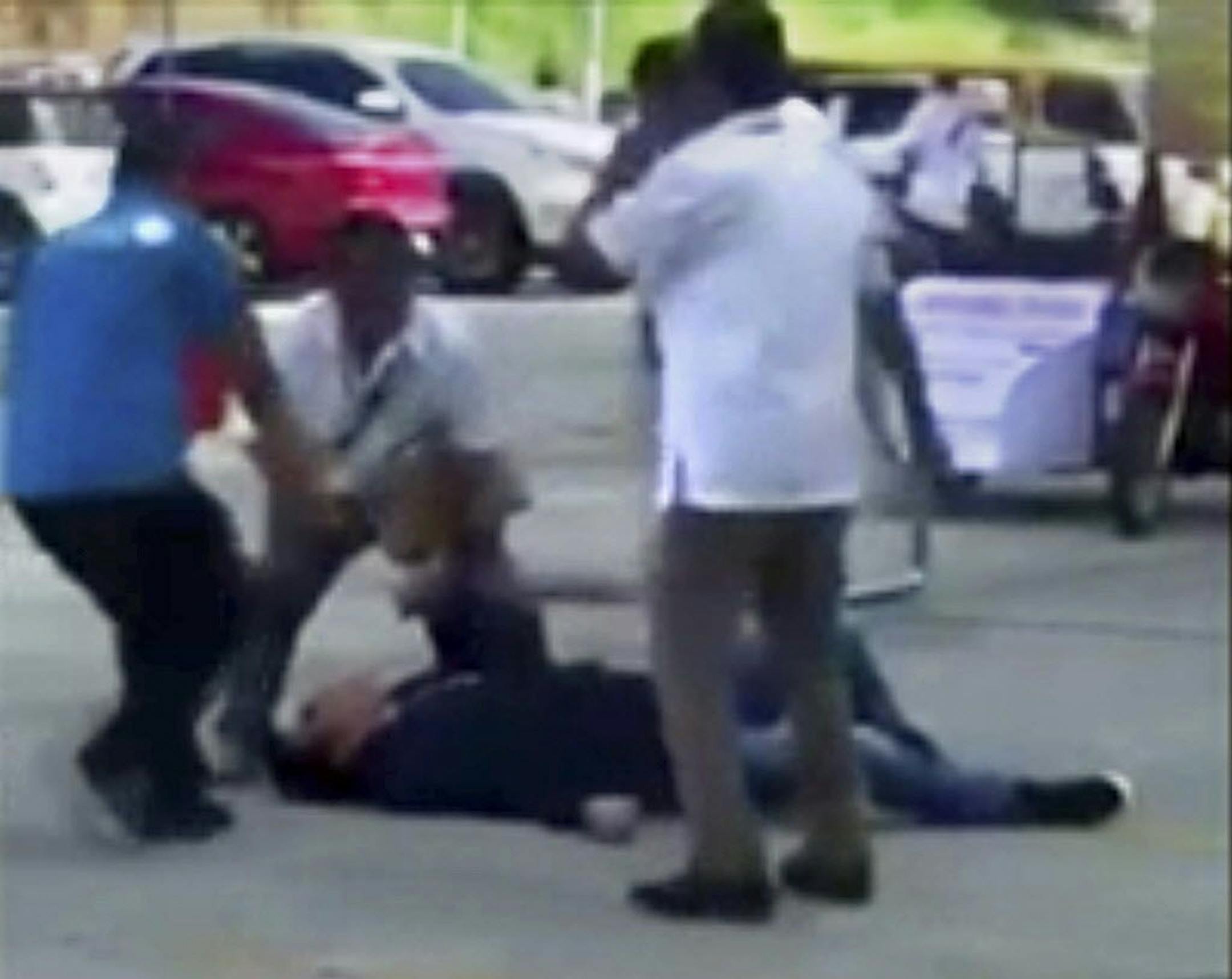 In this image made from video, Philippines Mayor Antonio Halili is seen on the ground after being shot during a flag-raising ceremony, Monday, July 2, 2018, in Tanauan city, south of Manila, Philippines. Mayor Halili known for parading drug suspects in public but also alleged to have drug ties himself was shot and killed by a sniper Monday in a brazen attack in front of horrified employees and village leaders. (AP