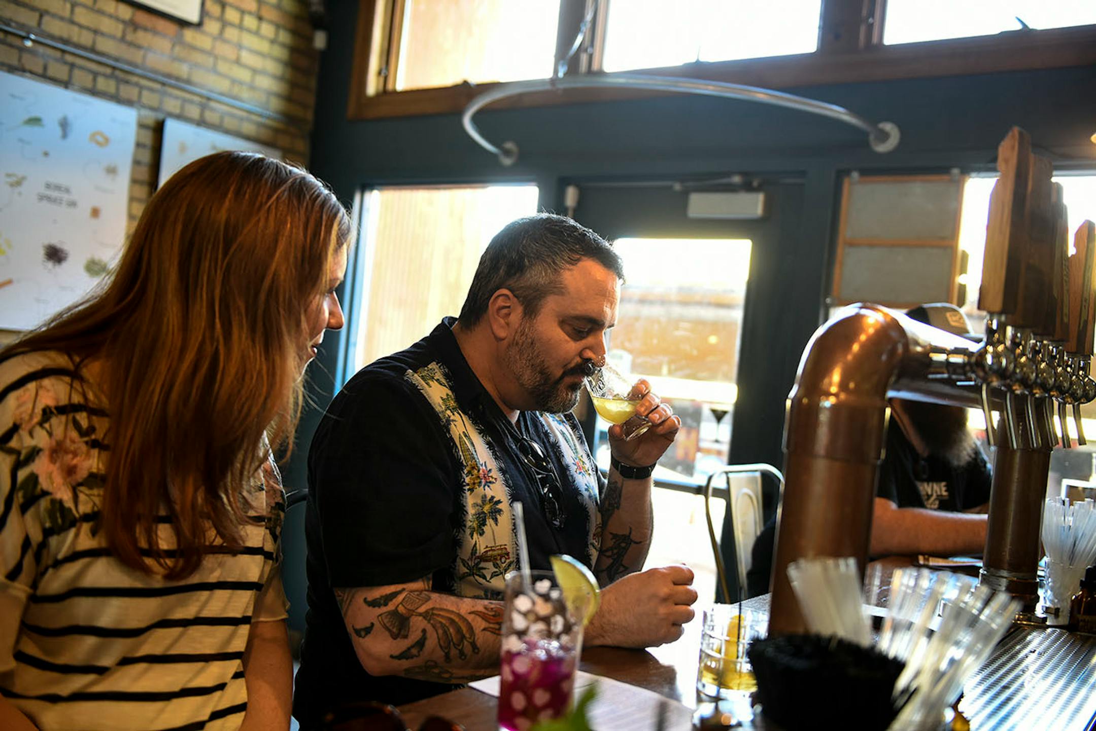 Heather Fye and Eric Baltrinic, teachers from Winona, tried an "On the Fence" cocktail Wednesday at Vikre Distillery in Duluth.