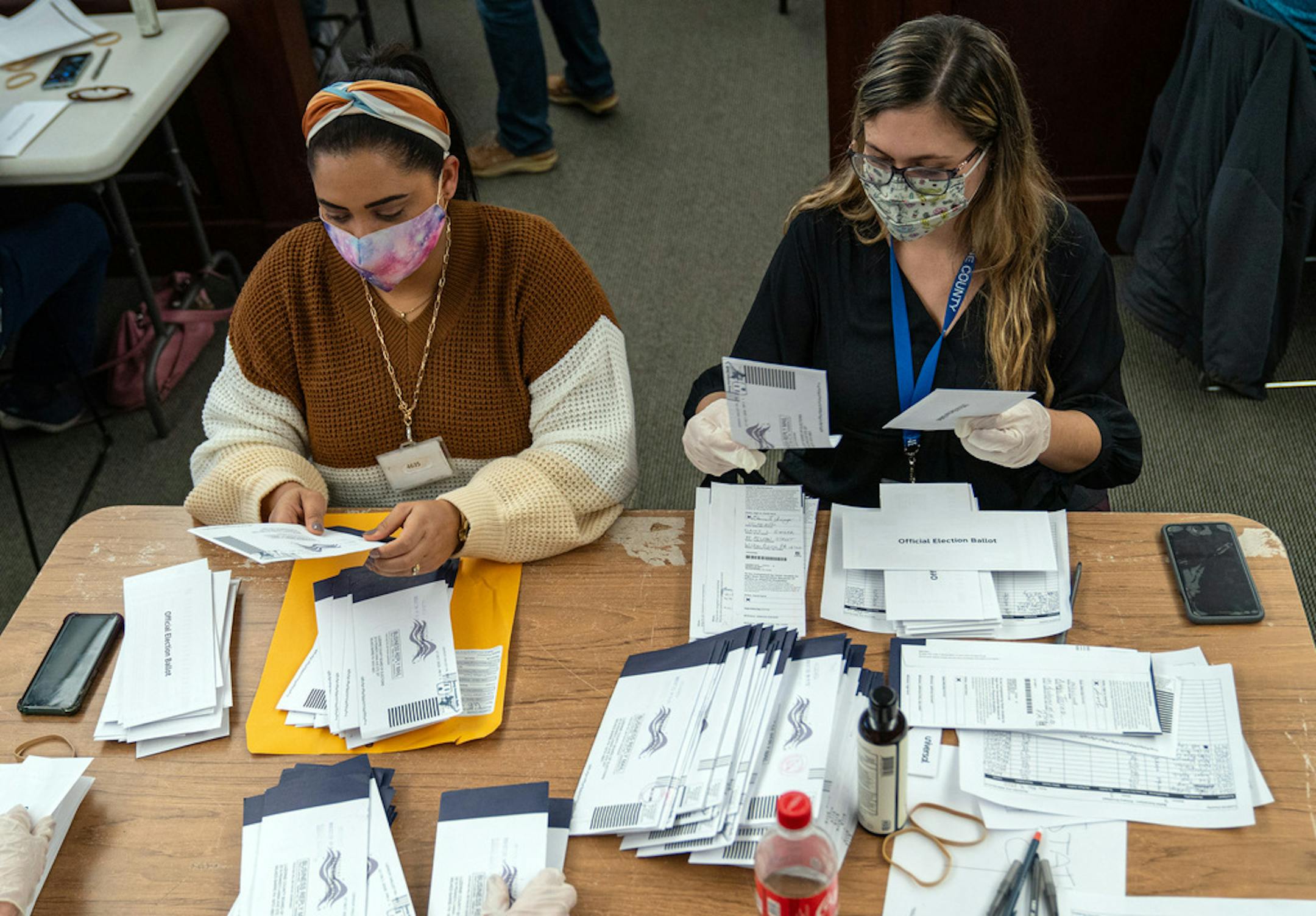 Luzerne County Bureau of Elections officials and city employees sort through and count mail-in and absentee ballots Wednesday, Nov. 4, 2020, in the Luzerne County Government Center in Wilkes Barre, Pa. (Robert Nickelsberg/The New York Times)
