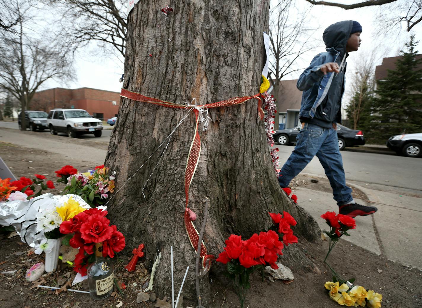 Dalil Shabazz, 17, was one of the friends of homicide victim 17- year-old Maurice O. Brown that paid their respect to him during visited of a makeshift memorial Sunday in the 2200 block of 13th Avenue South. April 5, 2015 in Minneapolis, Minnesota. Brown was shot Tuesday night (March 31, 2015) at this location. ] Jerry Holt/ Jerry.Holt@Startribune.com ORG XMIT: MIN1504061255142371