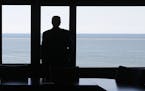 Republican presidential candidate Donald Trump looks out at Lake Michigan as he visits the Milwaukee County War Memorial Center on a campaign stop in 