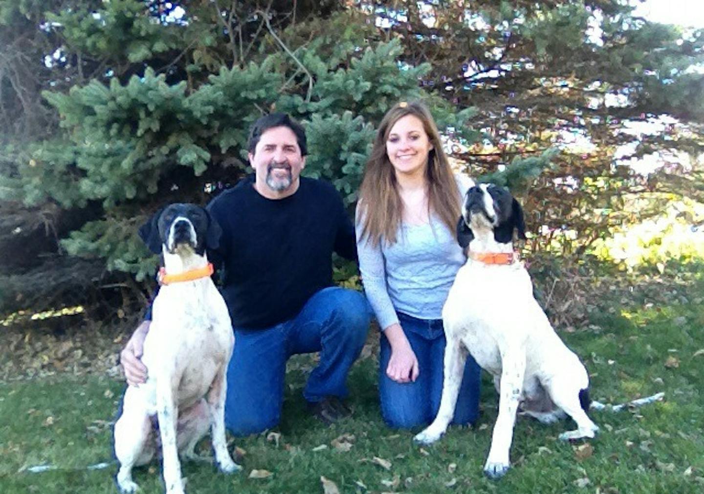 Tom Rakow with the youngest of his four daughters, Faith, 15, and pointers Blessing and Lost Arrow. All of the Rakow girls are accomplished hunters.