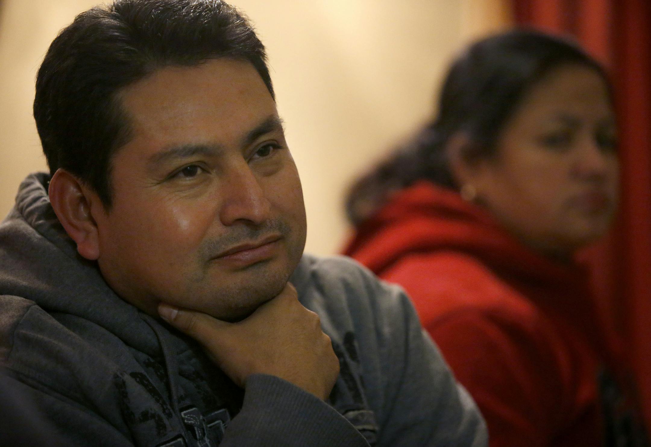 Undocumented immigrants Mario and Martha photographed at their home in Minneapolis. ] CARLOS GONZALEZ cgonzalez@startribune.com - November 18, 2014, Minneapolis, Minn., President Obama is gearing up to announce an executive order on immigration that would shield as many as 5 million immigrants nationally and thousands in Minnesota from the threat of deportation.