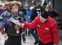 Vikings fan Gregory W Hanson was checked by a security guard at U.S Bank Stadium Sunday October 15,2017 in Minneapolis, MN. ]