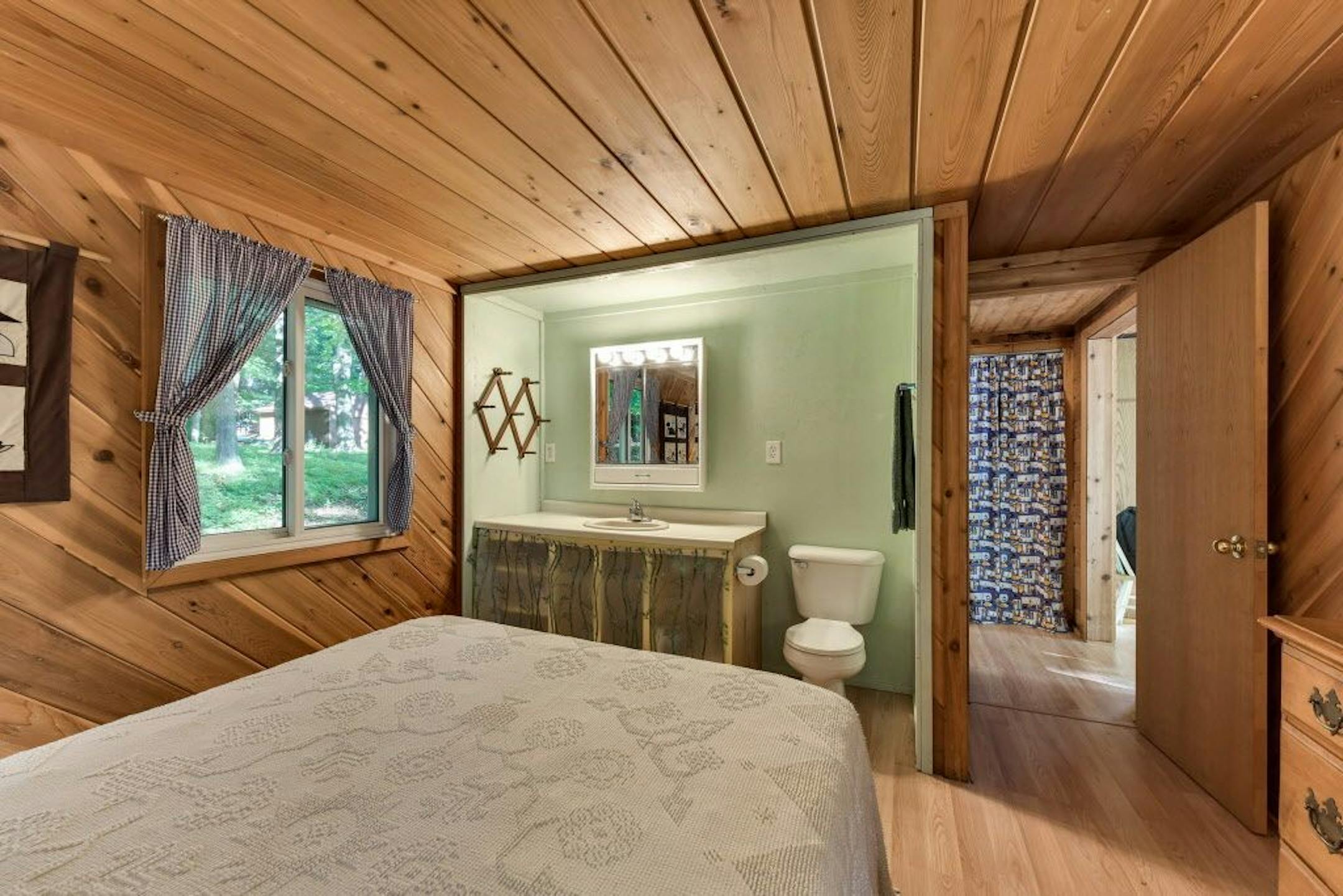 Bedroom and one of two bathrooms.