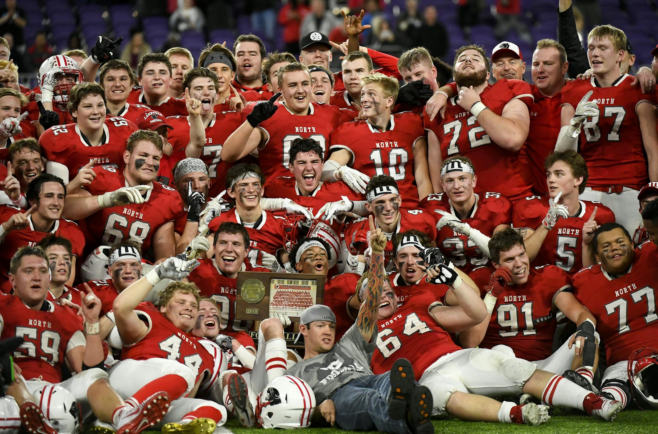 Lakeville North celebrated with their 6A championship trophy after defeating Eden Prairie 28-21 Friday night. ] Aaron Lavinsky • aaron.lavinsky@startribune.com Eden Prairie played Lakeville North in the Class 6A state tournament championship football game on Friday, Nov. 23, 2018 at US Bank Stadium in Minneapolis, Minn.
