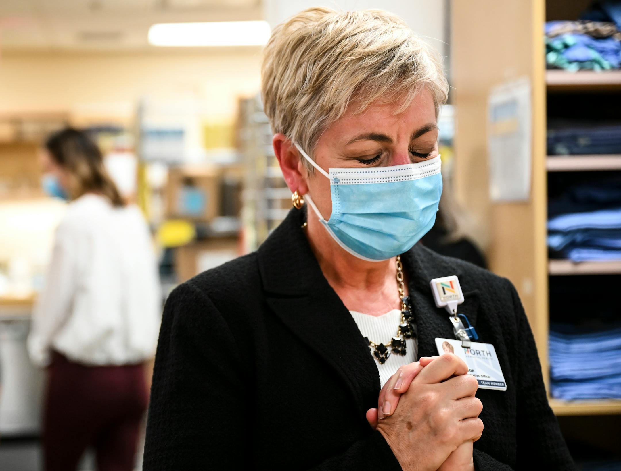 North Memorial Health Hospital Chief Administrative Officer Samantha Hanson was overcome with joy after 975 doses of the Pfizer COVID-19 vaccine were unboxed and placed into a specialized freezer in the hospital pharmacy Tuesday morning.