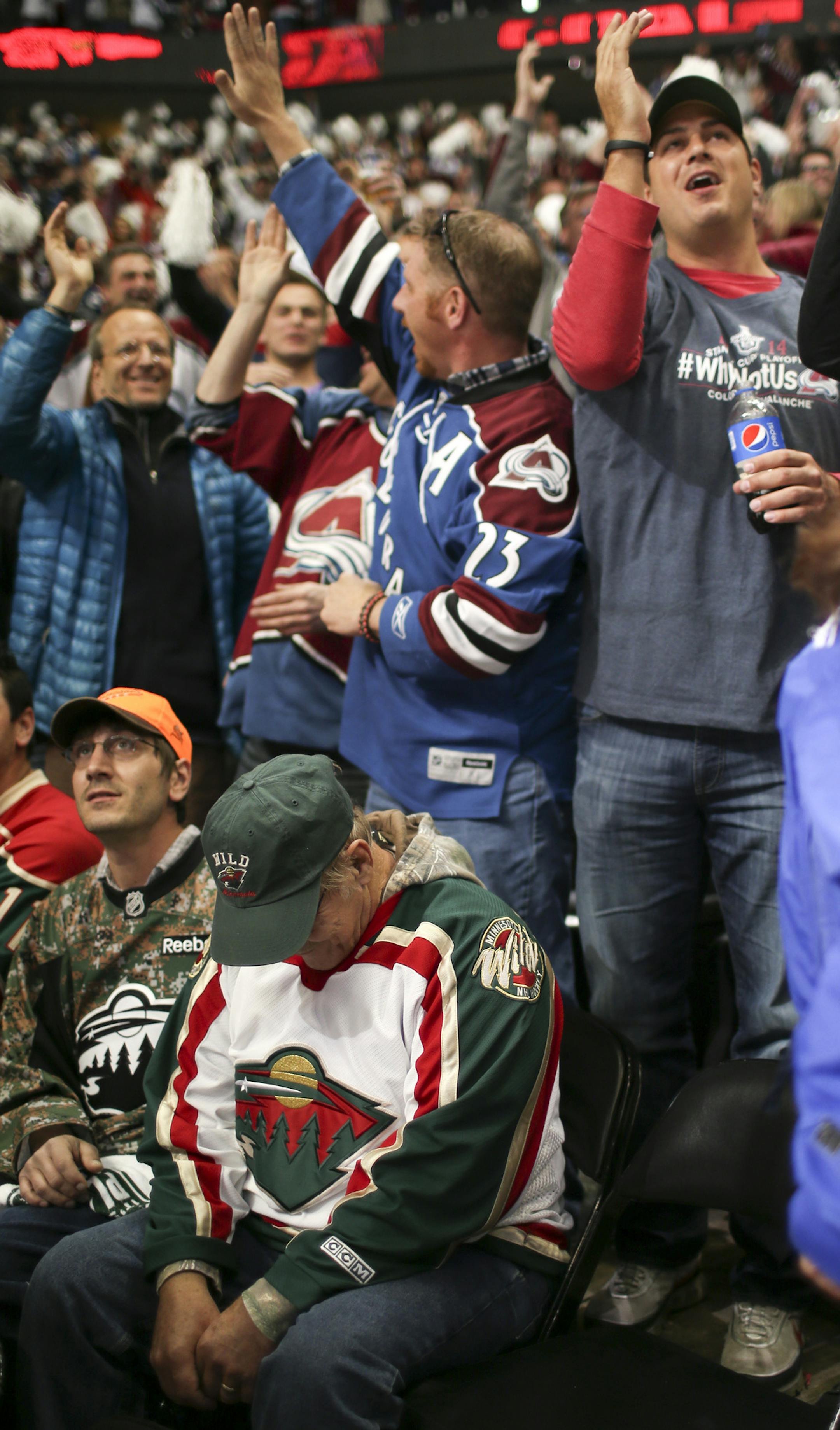 Minnesota Wild fans hang their head as the Colorado Avalanche go up 4-3 during the third period of play during game 7 of the opening round of the Stanley Cup playoffs Wednesday night at Pepsi Center in Denver. ] JEFF WHEELER ‚Ä¢ jeff.wheeler@startribune.com The Minnesota Wild faced the Colorado Avalanche in game 7 of their NHL opening round playoff series Wednesday night, April 29, 2014, at Pepsi Center in Denver.