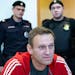 Russian opposition leader Alexei Navalny speaks to the media prior to a court session in Moscow on Aug. 22, 2019. Navalny, the fiercest foe of Russian