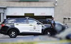 Minneapolis police officers investigated a crime scene in the North Loop neighborhood last summer.