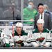 Minnesota Wild head coach Dean Evason stands behind the bench during the second period of the team's NHL hockey game against the Seattle Kraken, Thurs