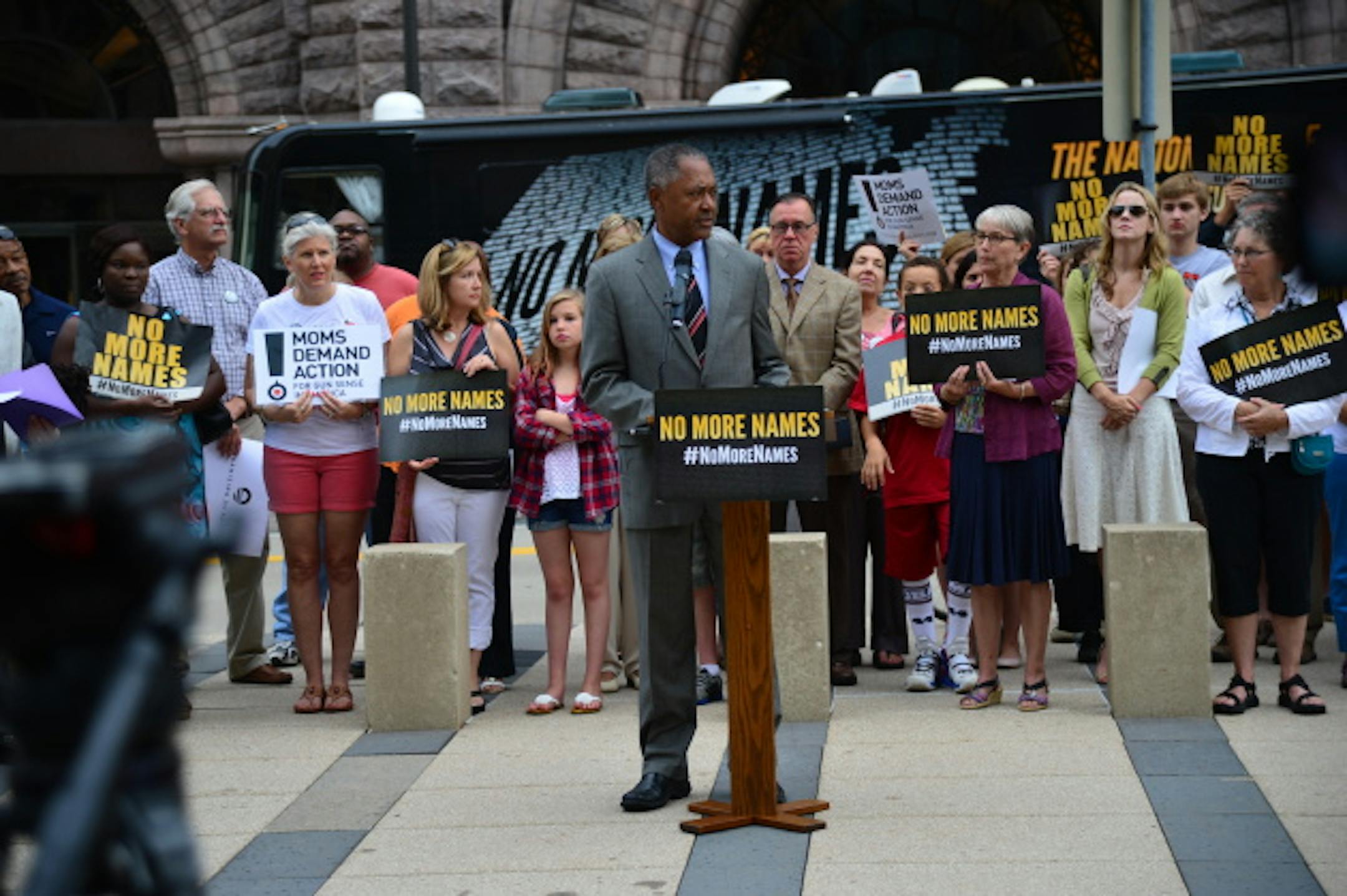 Don Samuels, chair of the City Council's Public Safety Committee, called on Wednesday for expanded background checks for gun purchases at the "No More Names" bus tour stop at Minneapolis City Hall.