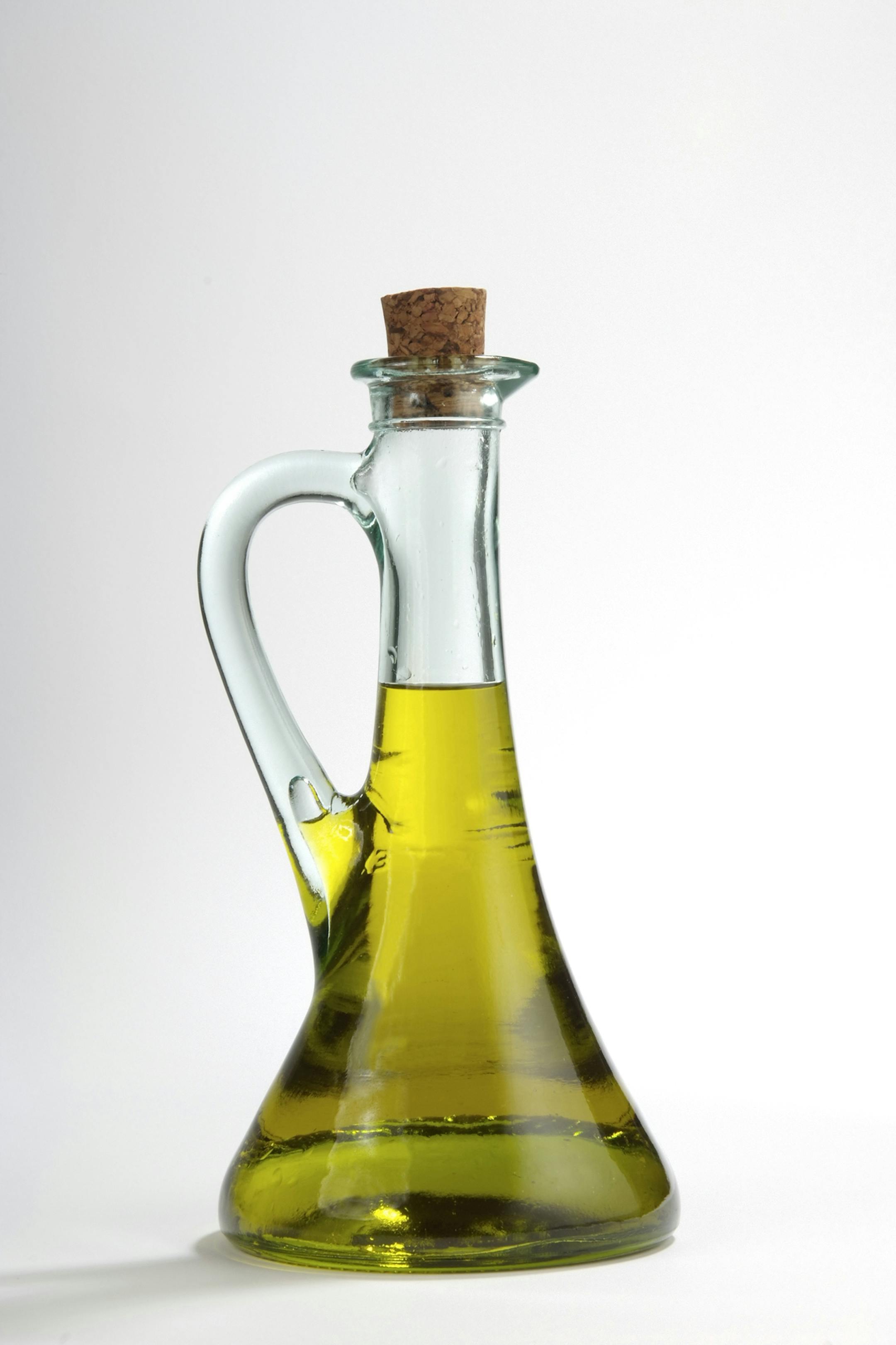 olive oil in a glass cruet, from istock ORG XMIT: MIN1412030909340112