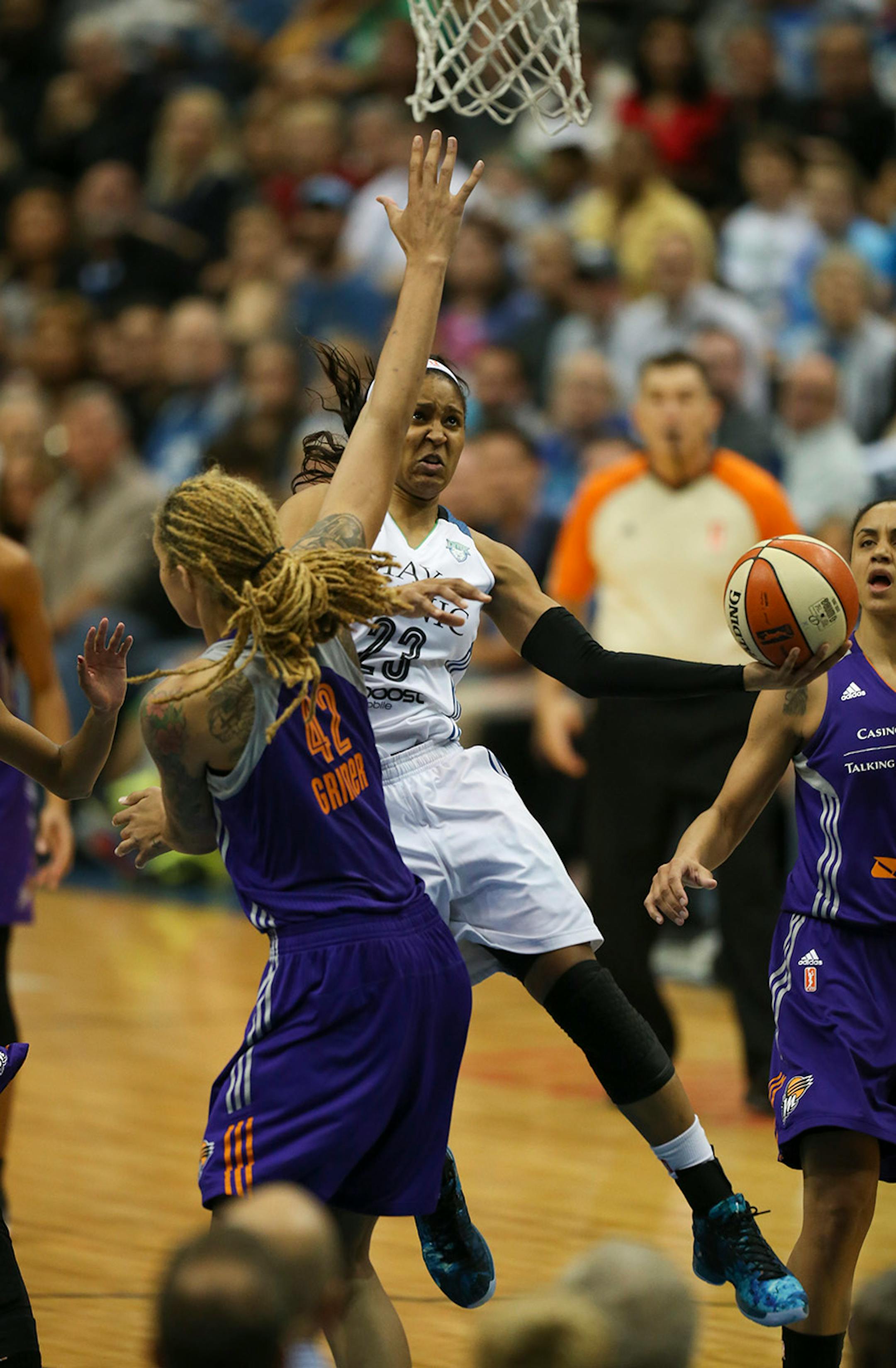 Lynx forward Maya Moore (23) went up for two points in the fourth quarter around Phoenix Mercury center Brittney Griner (42) Thursday night at Target Center. She finished with 19 points for the night.