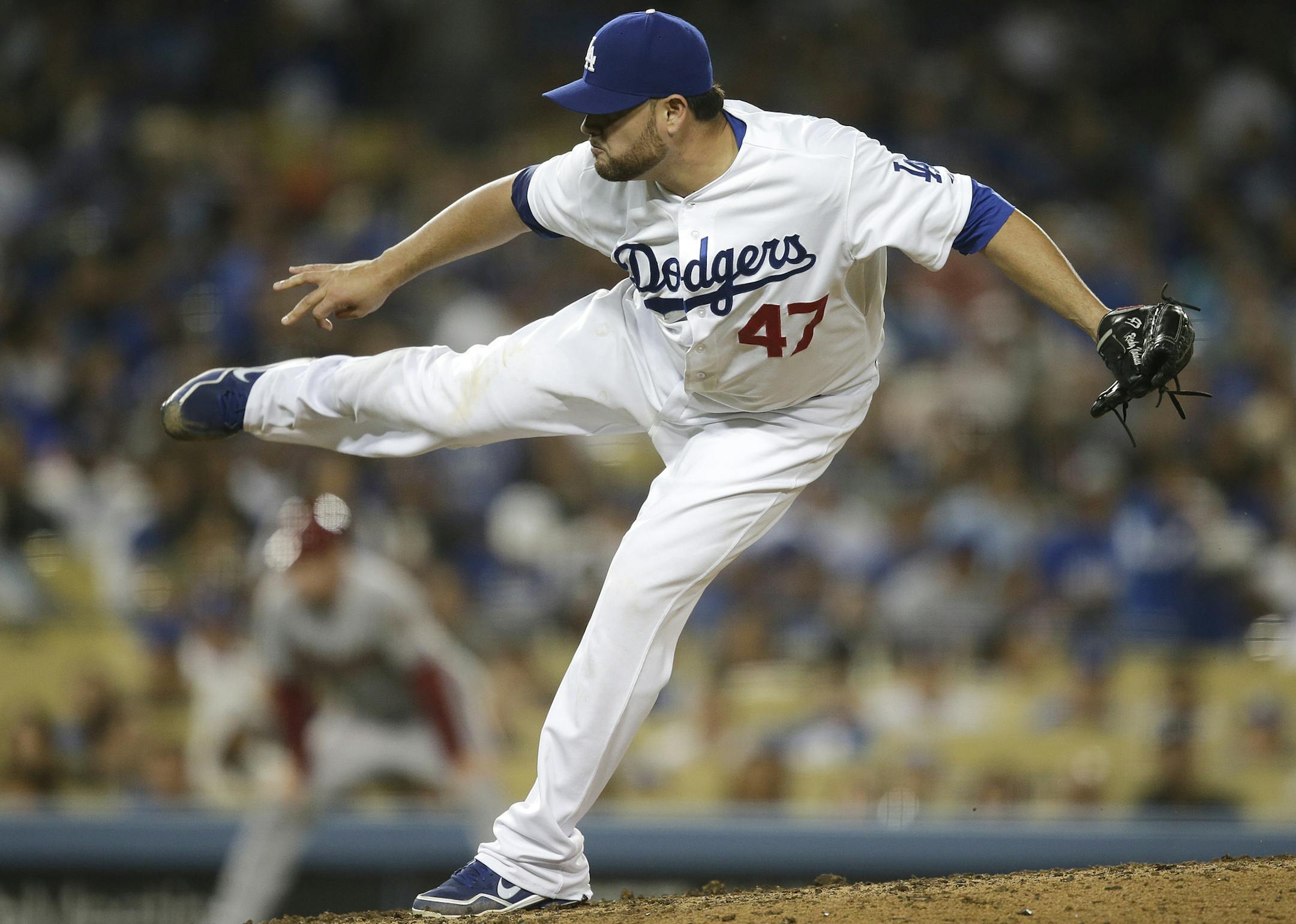 Los Angeles Dodgers starting pitcher Ricky Nolasco throws against the Arizona Diamondbacks during the fourth inning a baseball game on Monday, Sept. 9, 2013, in Los Angeles. (AP Photo/Jae C. Hong) ORG XMIT: LAD113