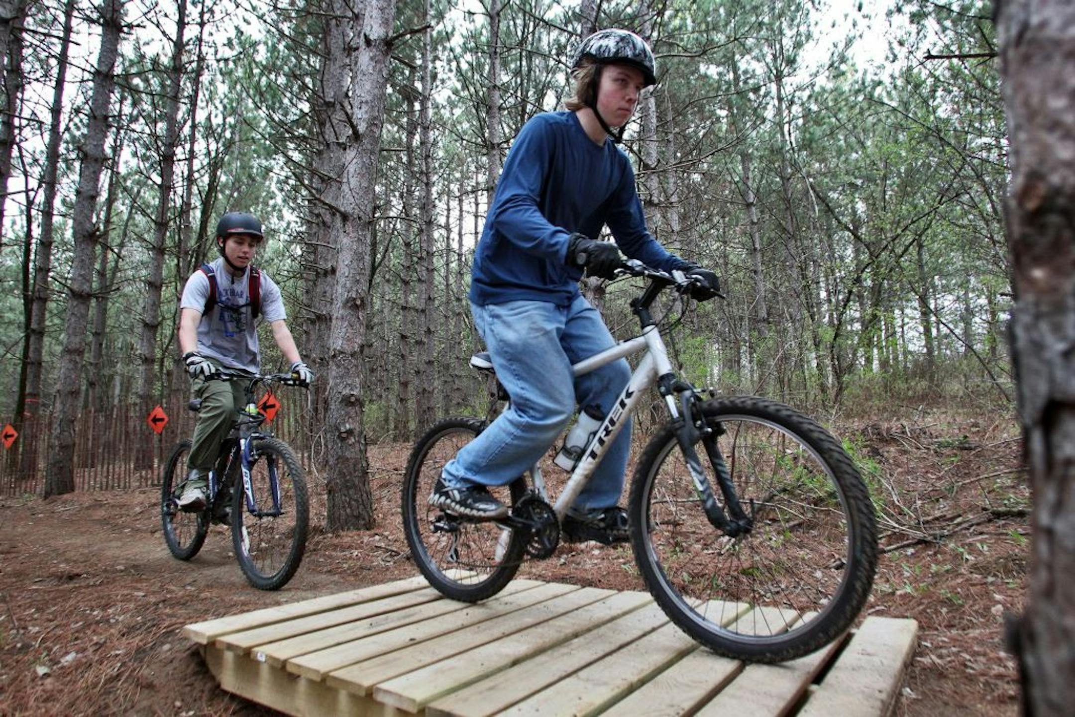 There are plans underway to start high school mountain bike racing in the fall. Photos of bike riders at Lebanon Hills Regional Park in Eagan. Adam DeCurtins, 15, left and John Garbe, 15, both of Savage, are interested in biking as a school sport. (MARLIN LEVISON/STARTRIBUNE(mlevison@startribune.com