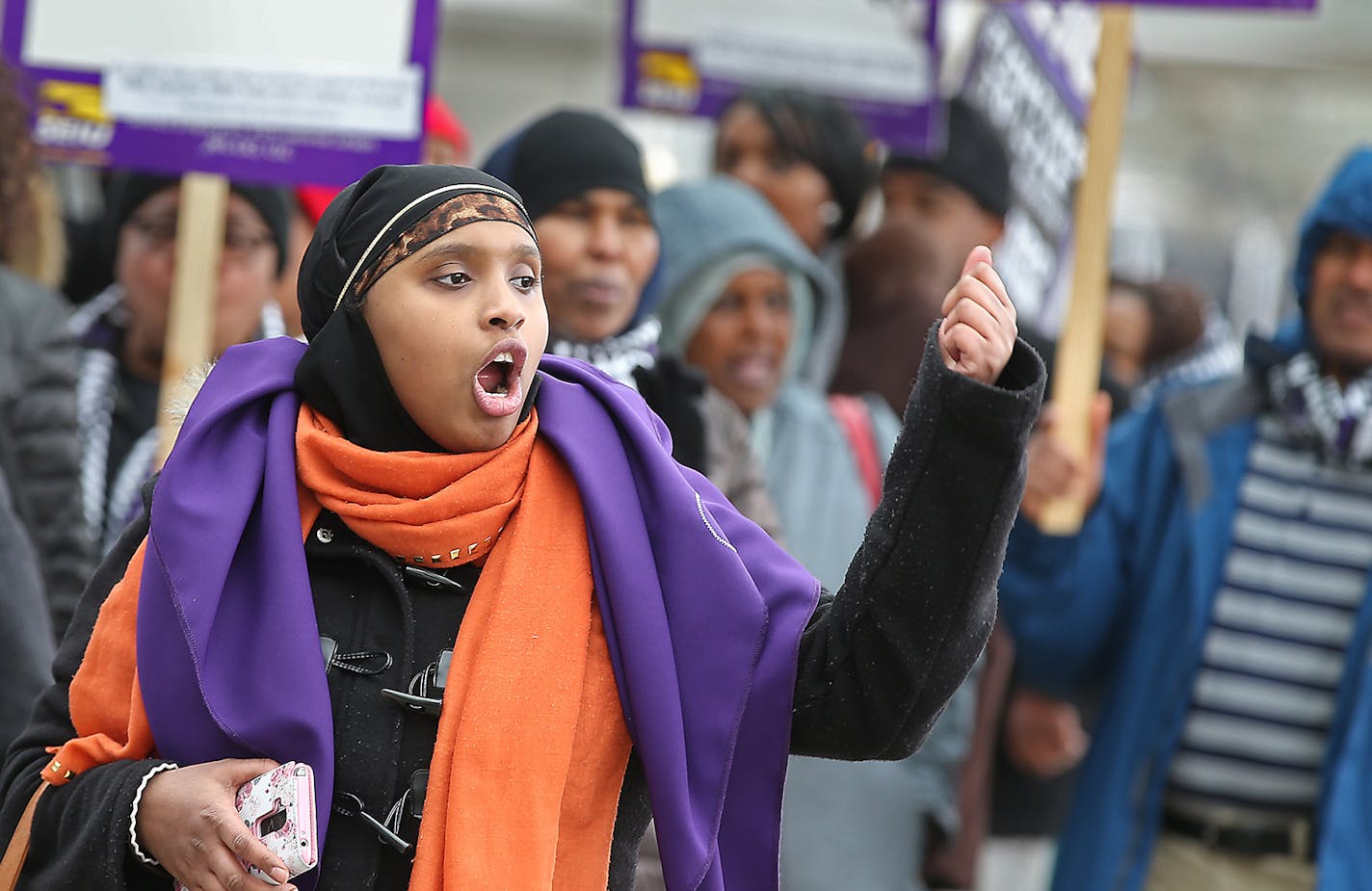 Randa Jama, cq, led a group of janitors and their supporters as they went on strike for a day at Lindbergh Terminal, Wednesday, February 17, 2016 in Bloomington, MN. ] (ELIZABETH FLORES/STAR TRIBUNE) ELIZABETH FLORES &#x2022; eflores@startribune.com