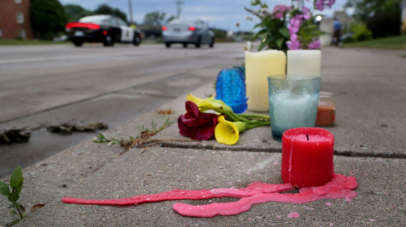 Spilled wax from a memorial candle has dried on the sidewalk in Falcon Heights Thursday, July, 7, 2016, near where Philando Castile, 32, a St. Paul schools employee, was shot by a police officer and later died Wednesday night at HCMC. The shooting followed a traffic stop in Falcon Heights, MN.] (DAVID JOLES/STARTRIBUNE)djoles@startribune Protesters at Governor's mansion after police involved shooting in Falcon Heights.**Philando Castile,cq ORG XMIT: MIN1607070801461992