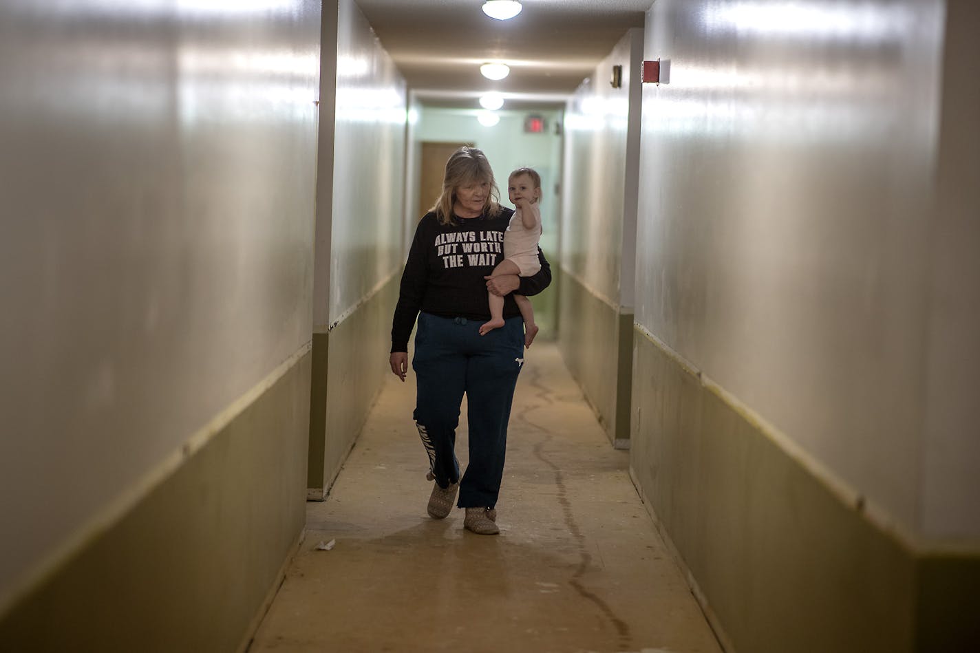 Michelle Doran, who babysat 16-month-old Maddielynn, cq, walked down her hallway where construction is being done in the complex, Wednesday, January 29, 2020 in New Brighton, MN. ] ELIZABETH FLORES &#x2022; liz.flores@startribune.com