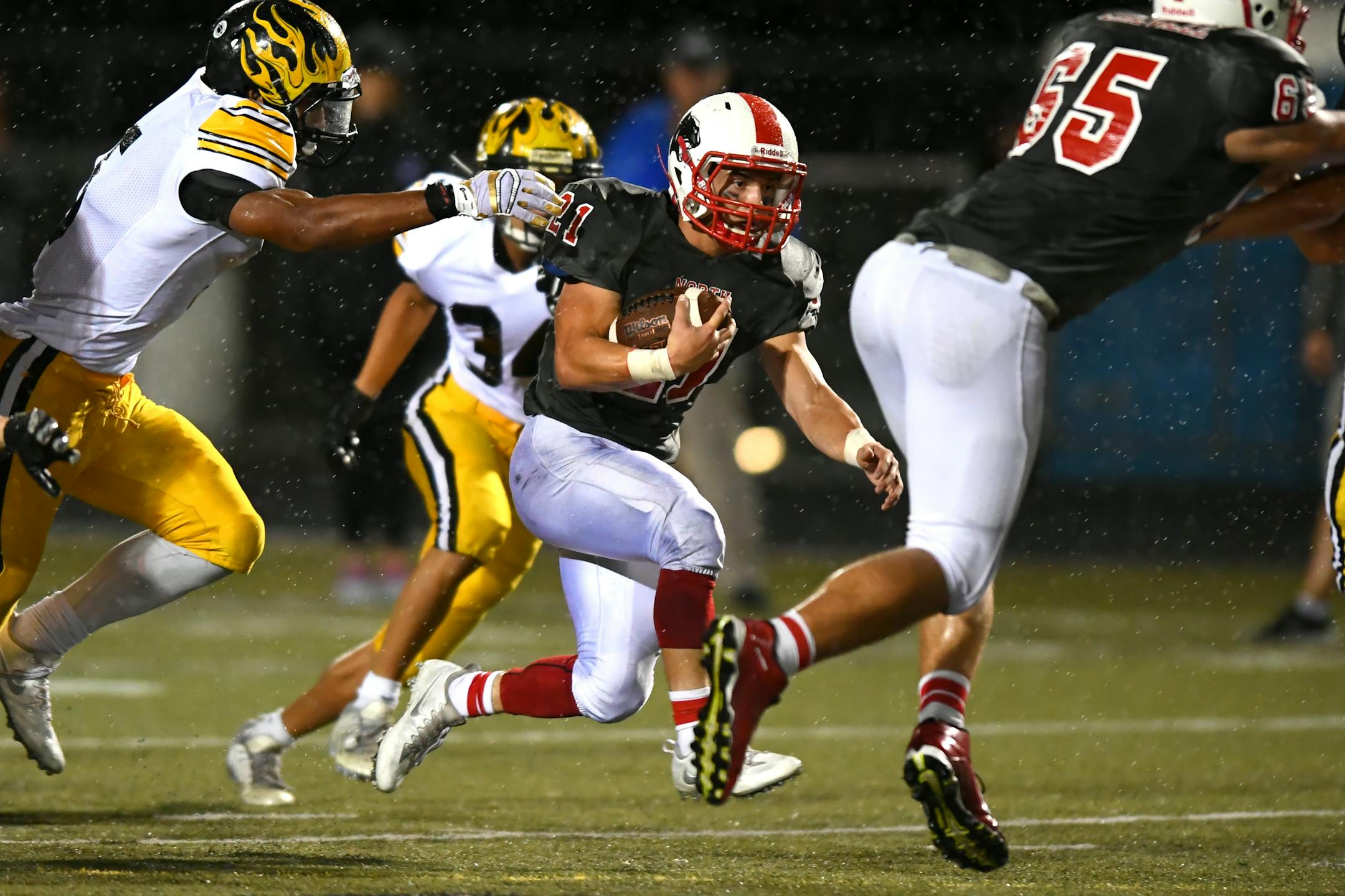 Running back Wade Sullivan (21) and Lakeville North take on Totino-Grace in a Class 6A quarterfinal game at Edina Community Center at 7 p.m. Thursday.