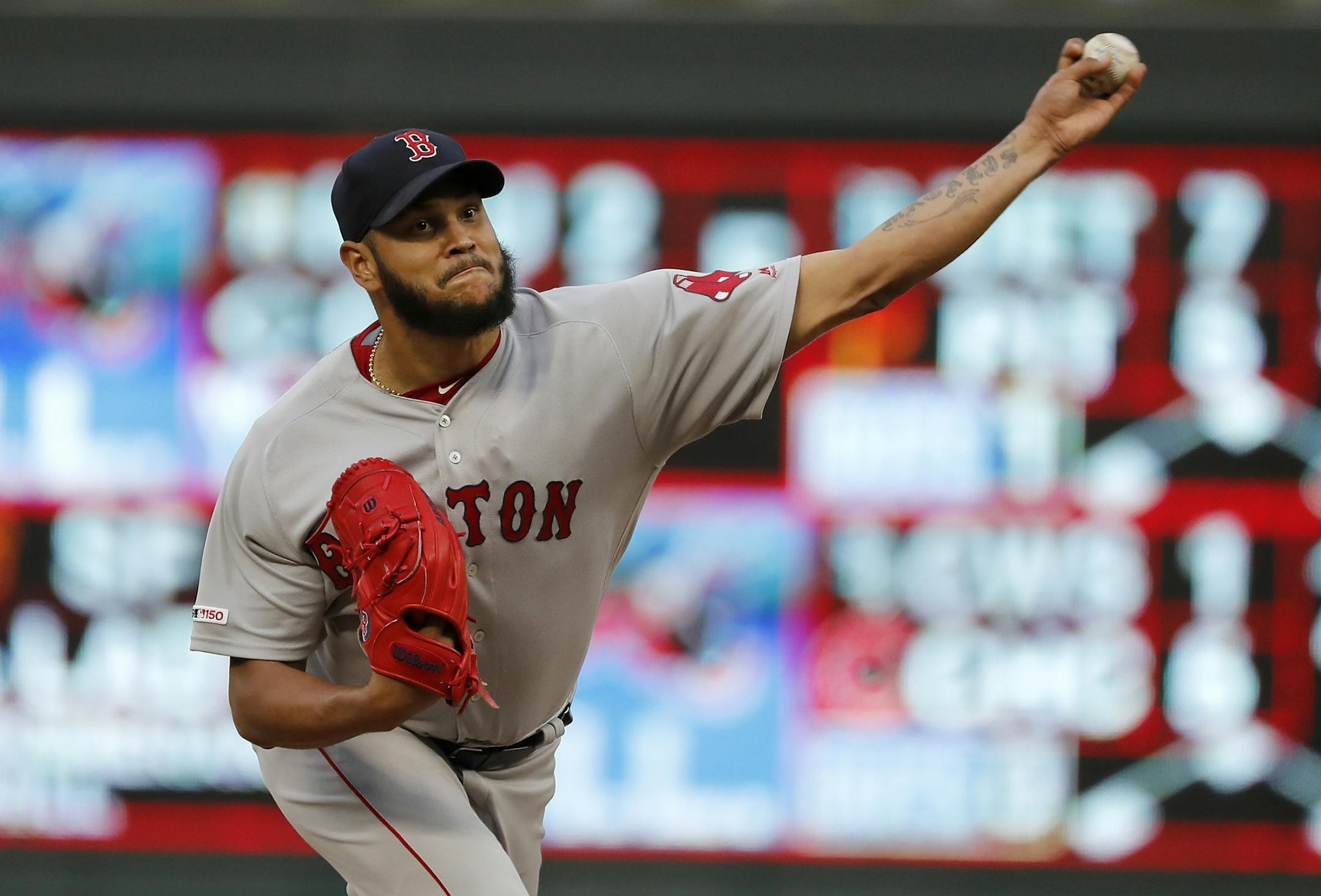 Boston Red Sox starting pitcher Eduardo Rodriguez (57) pitches in the third inning.