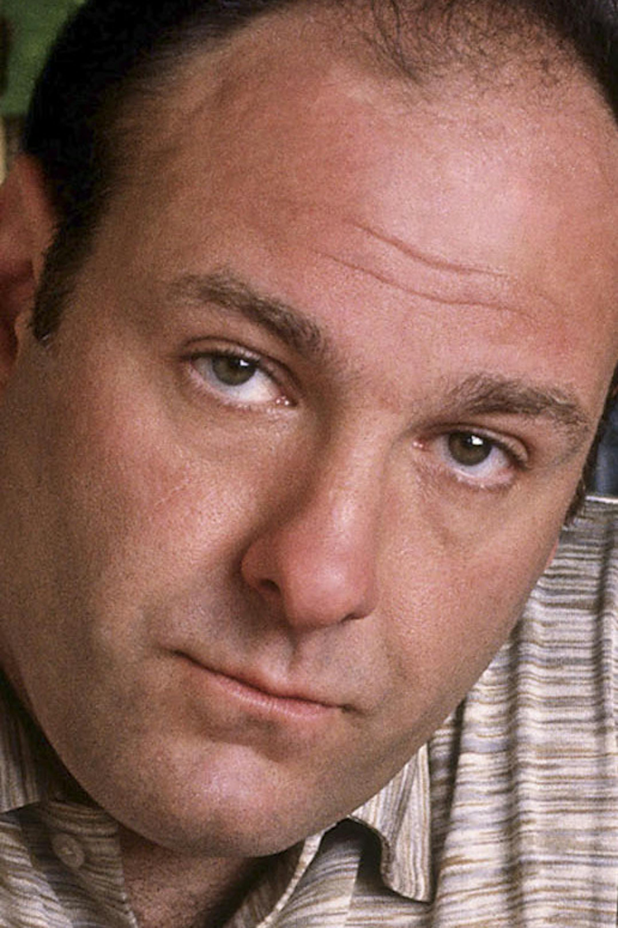 FILE - This 1999 file photo provided by HBO, shows James Gandolfini as mob boss Tony Soprano, in an episode from the first season of the HBO cable television mob series, "The Sopranos." HBO and the managers for Gandolfini say the actor died Wednesday, June 19, 2013, in Italy. He was 51. (AP Photo/HBO, Anthony Neste, File) ORG XMIT: MIN2013071910490425 ORG XMIT: MIN1307191053280130