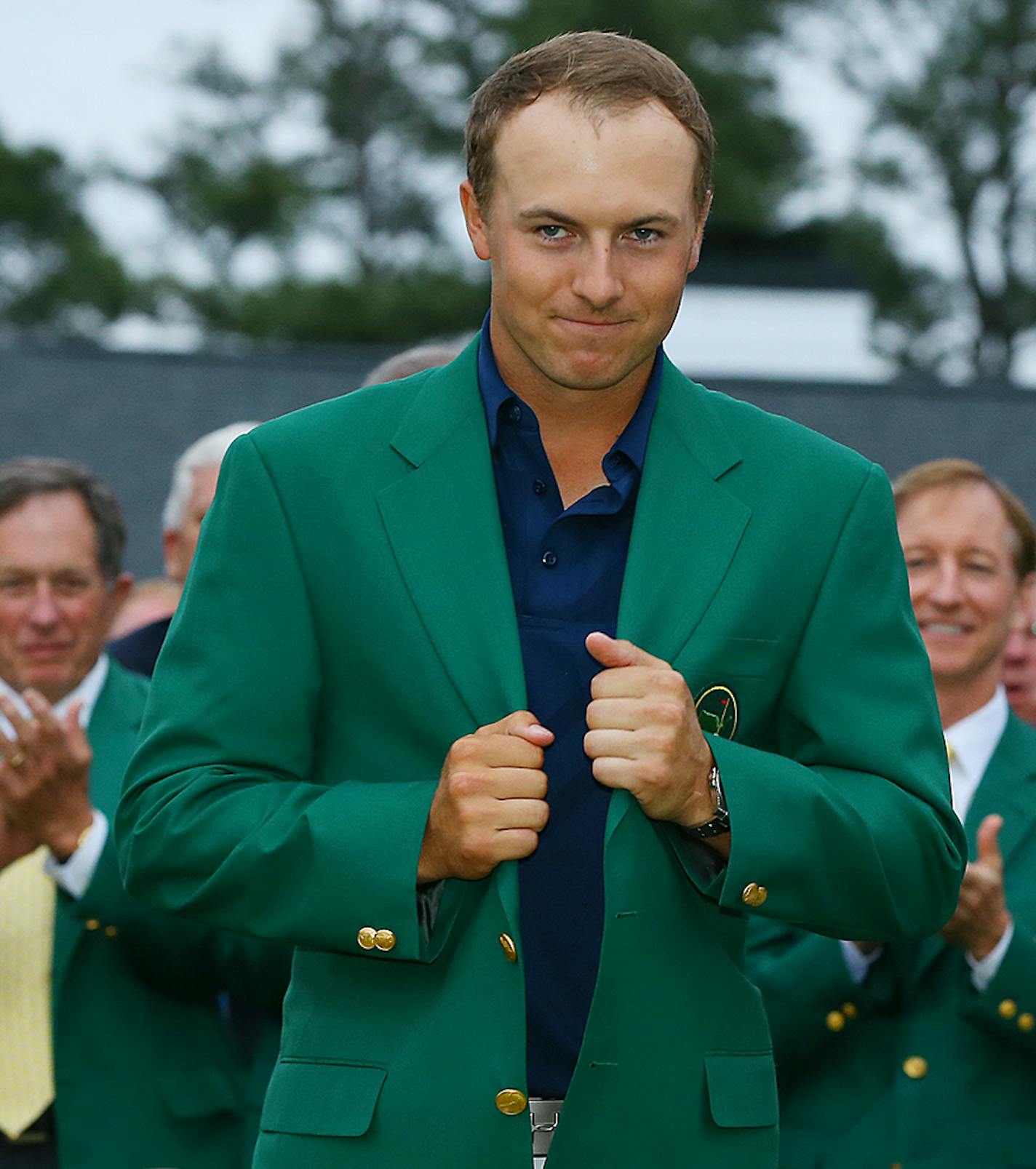 Jordan Spieth beams as he snugs up his green jacket after winning the Masters on Sunday, April 12, 2015, at Augusta National Golf Club in Augusta, Ga. (Curtis Compton/Atlanta Journal-Constitution/TNS) ORG XMIT: 1166535