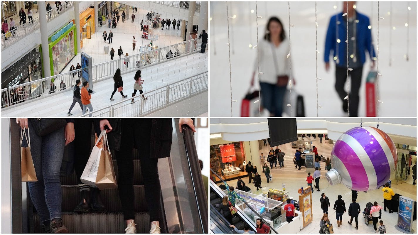 They're back: Some people shopped for sales, others returned recently opened gifts, but the walkways, escalators and stores inside the Mall of America were plenty busy Wednesday, the day after Christmas.