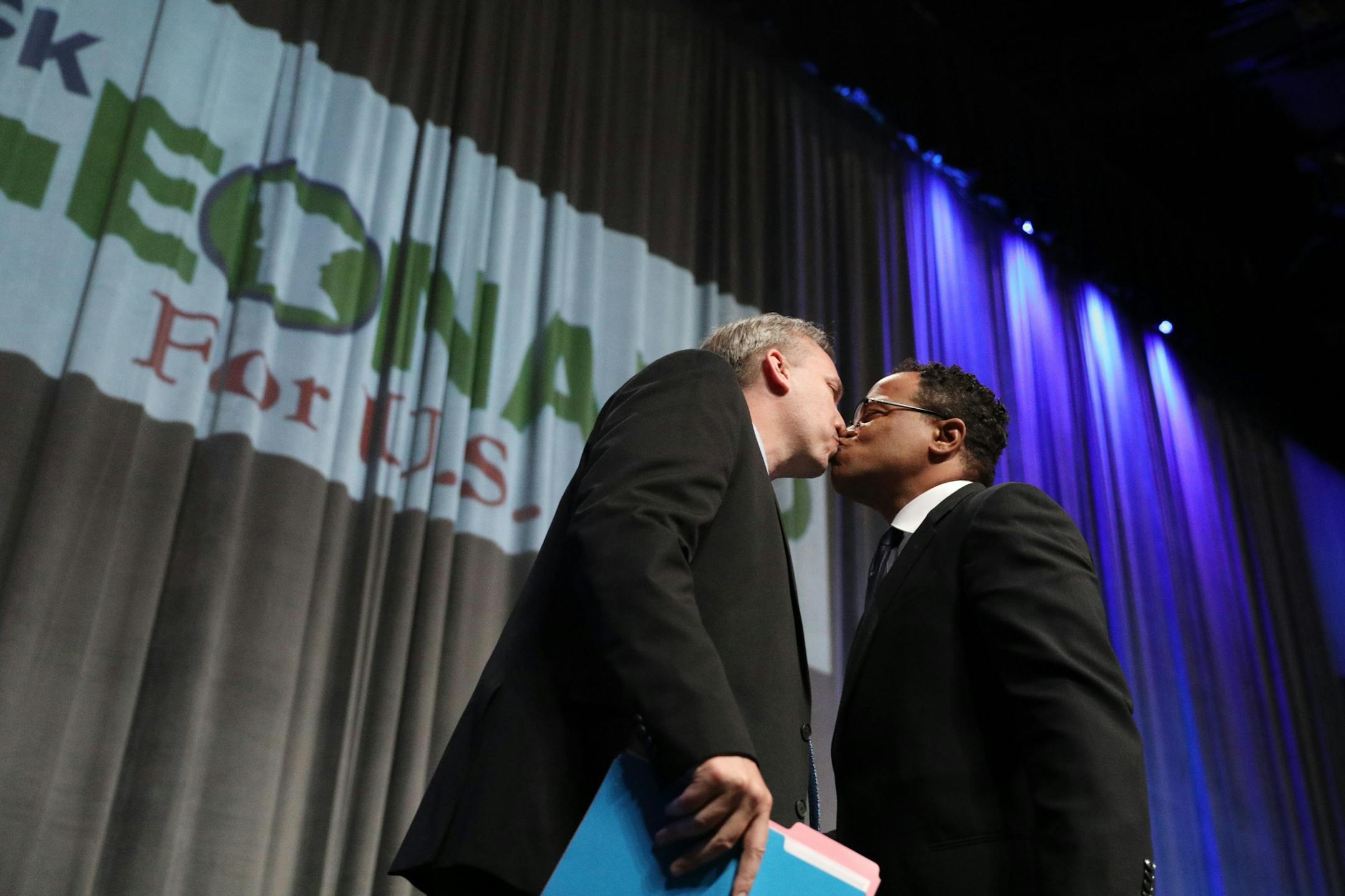 U.S. Senate candidate Nick Leonard gave a kiss to his husband after he introduced him from the stage during the DFL State Convention Friday.