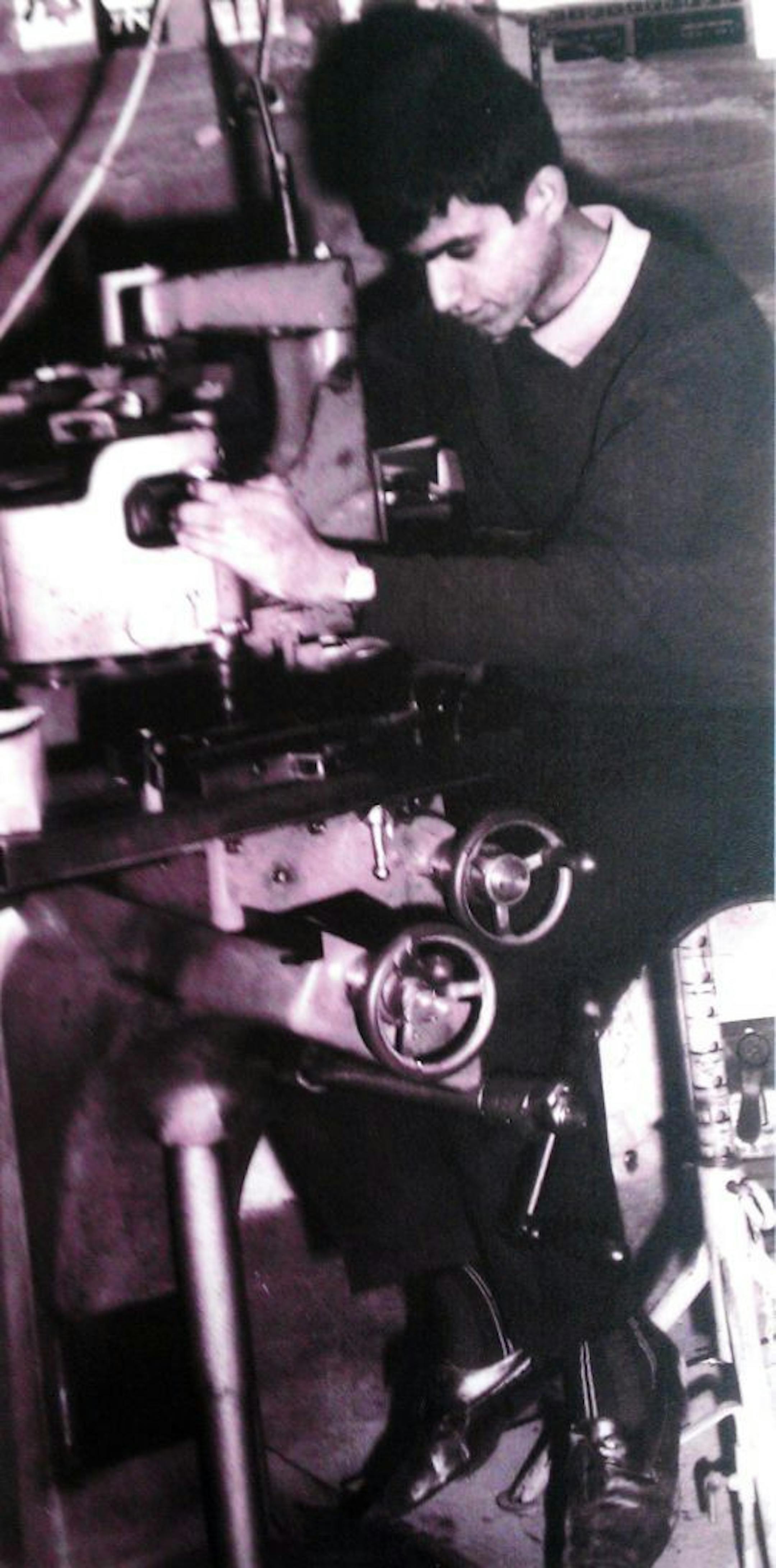 Reuven Rahamim at work in a sign factory in Israel, around age 14.