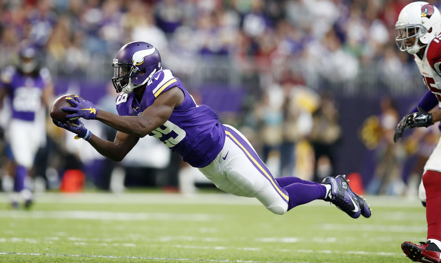 Vikings cornerback Xavier Rhodes intercepted a pass intended for Cardinals receiver Michael Floyd, helping preserve a 10-point lead in the third quarter.