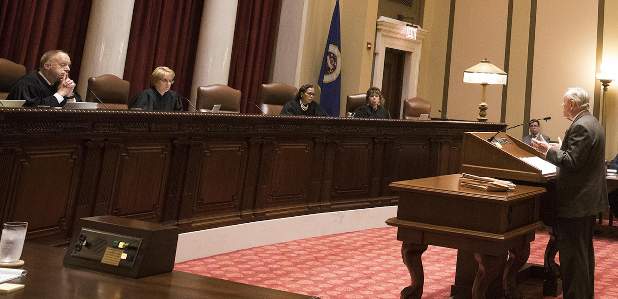 Sam Hanson, the attorney representing Gov. Mark Dayton, delivers his oral arguments before the Minnesota Supreme Court at the Capitol in St. Paul, Minn., Monday, Aug. 28, 2017, in the appeals case after the governor's attempt to eliminate funding for the Minnesota Legislature resulted in the Legislature suing him. (Leila Navidi/Star Tribune via AP) ORG XMIT: MIN2017082914125740