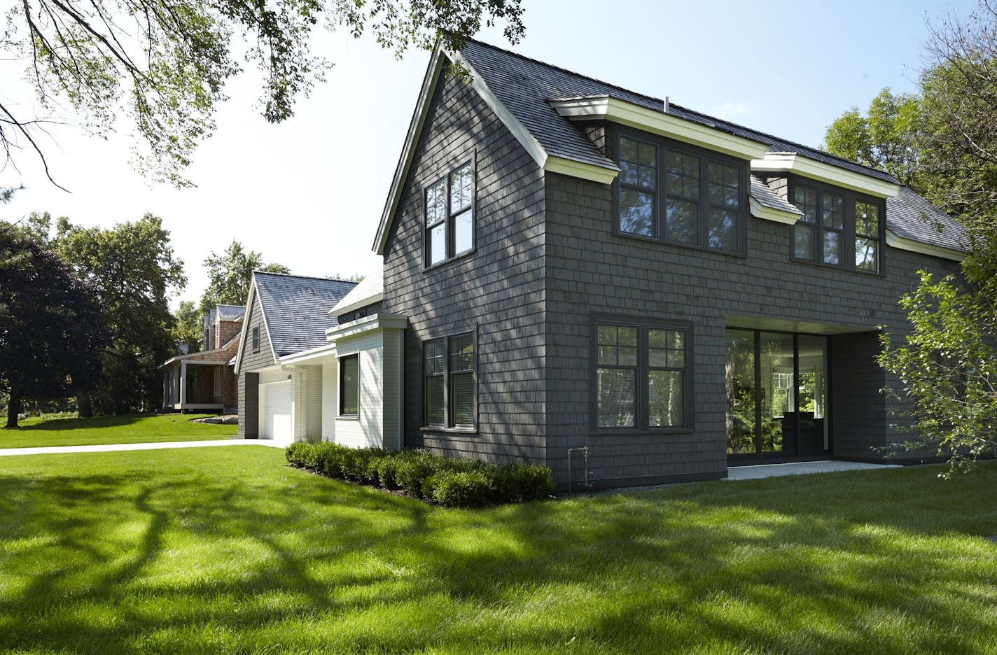 The three-level home is a modern updated version of traditional cottage-style in Cottagewood, an established neighborhood on Lake Minnetonka.