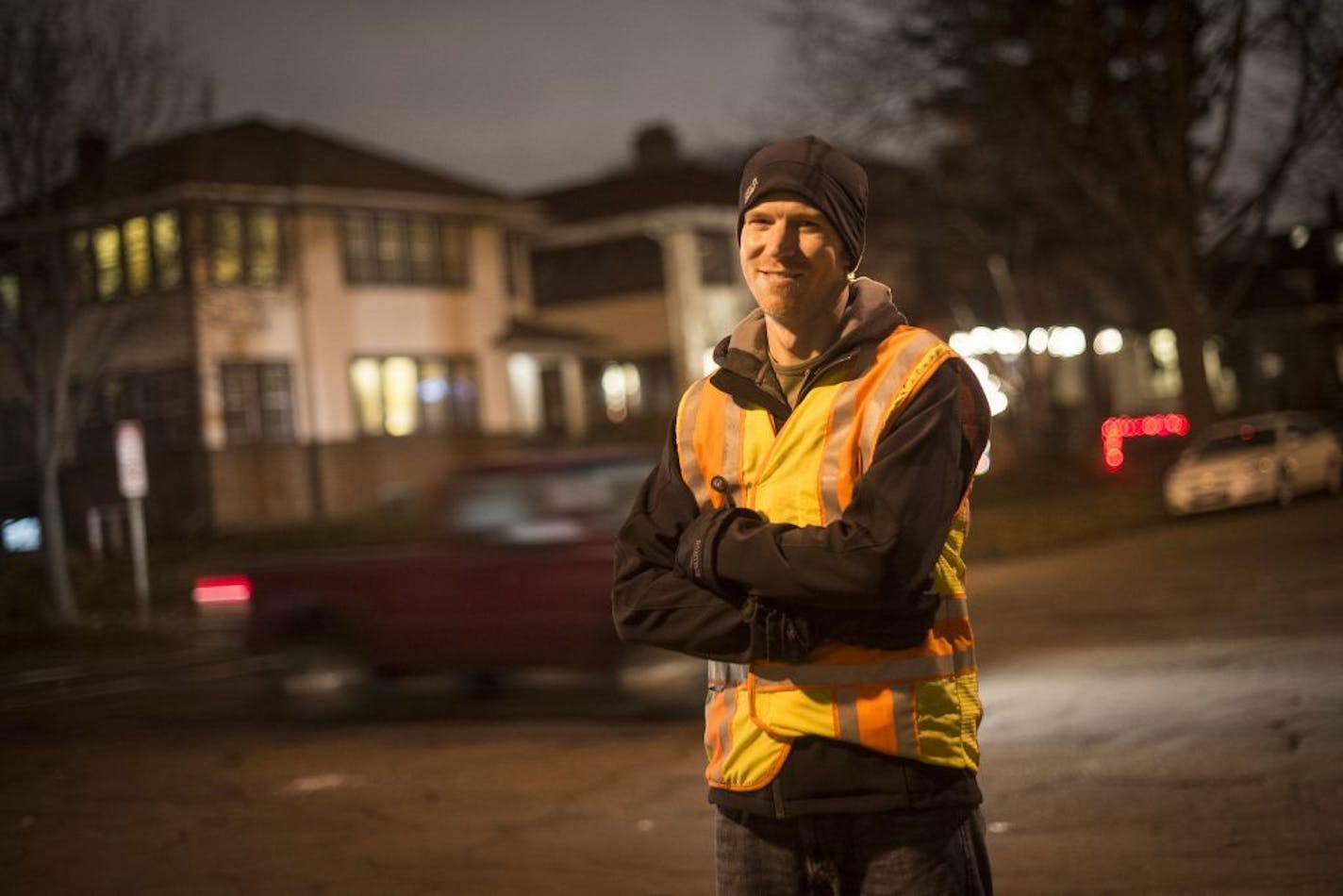 Michael Mechtenberg was photographed at Cleveland Avenue and Dayton Avenue in St. Paul Tuesday night. He wears a yellow vest to help make himself more visible to drivers.