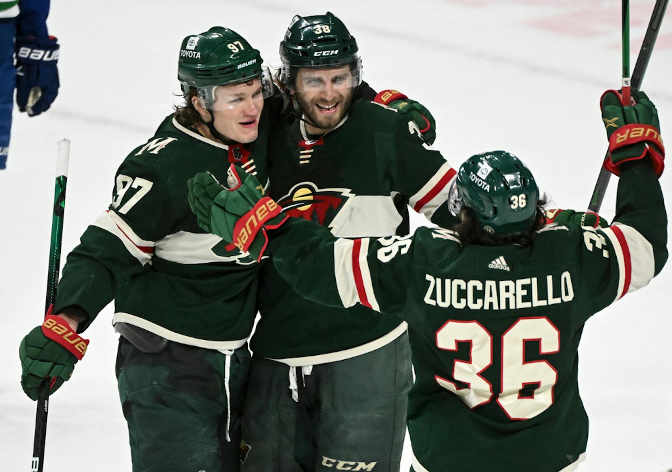 Minnesota Wild left wing Kirill Kaprizov (97), center Ryan Hartman (38) and right wing Mats Zuccarello (36) celebrated a goal late last season.