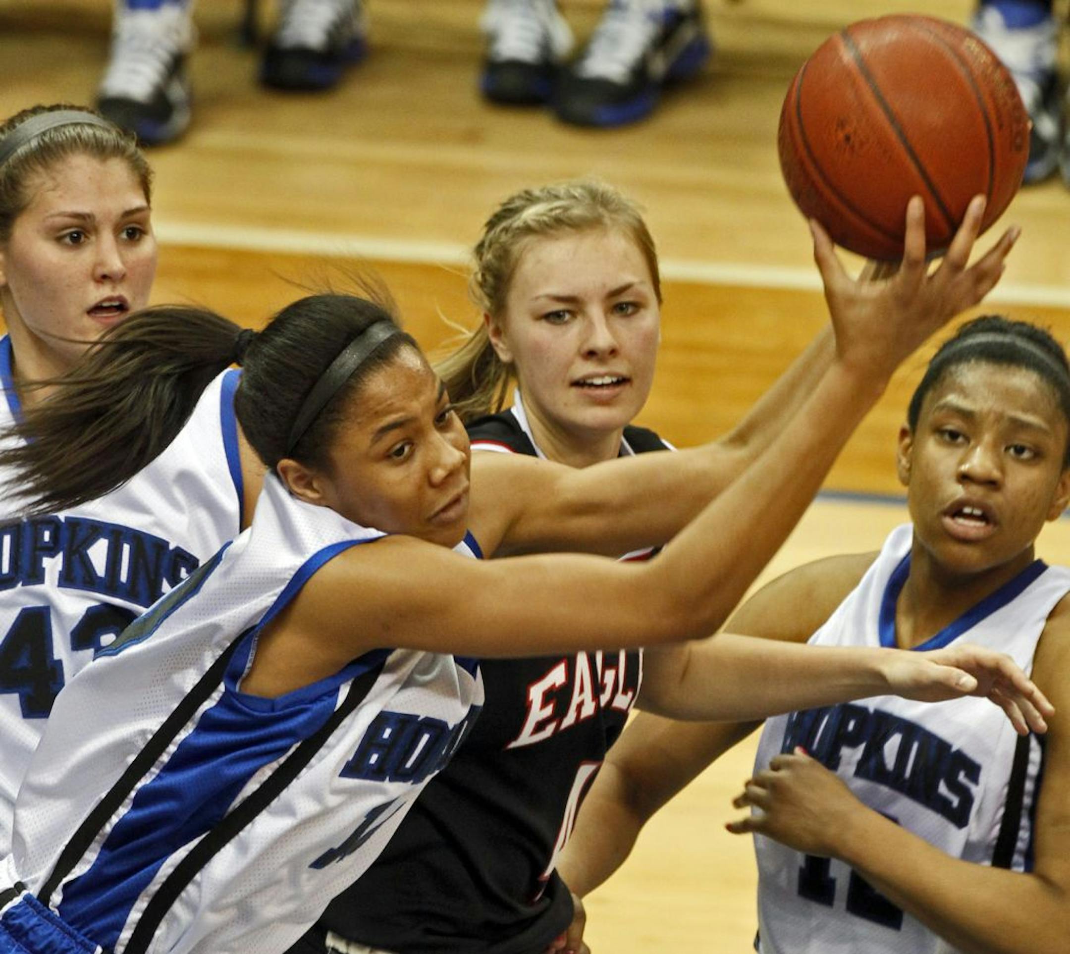 Hopkins' Nia Coffey grabbed a rebound.
