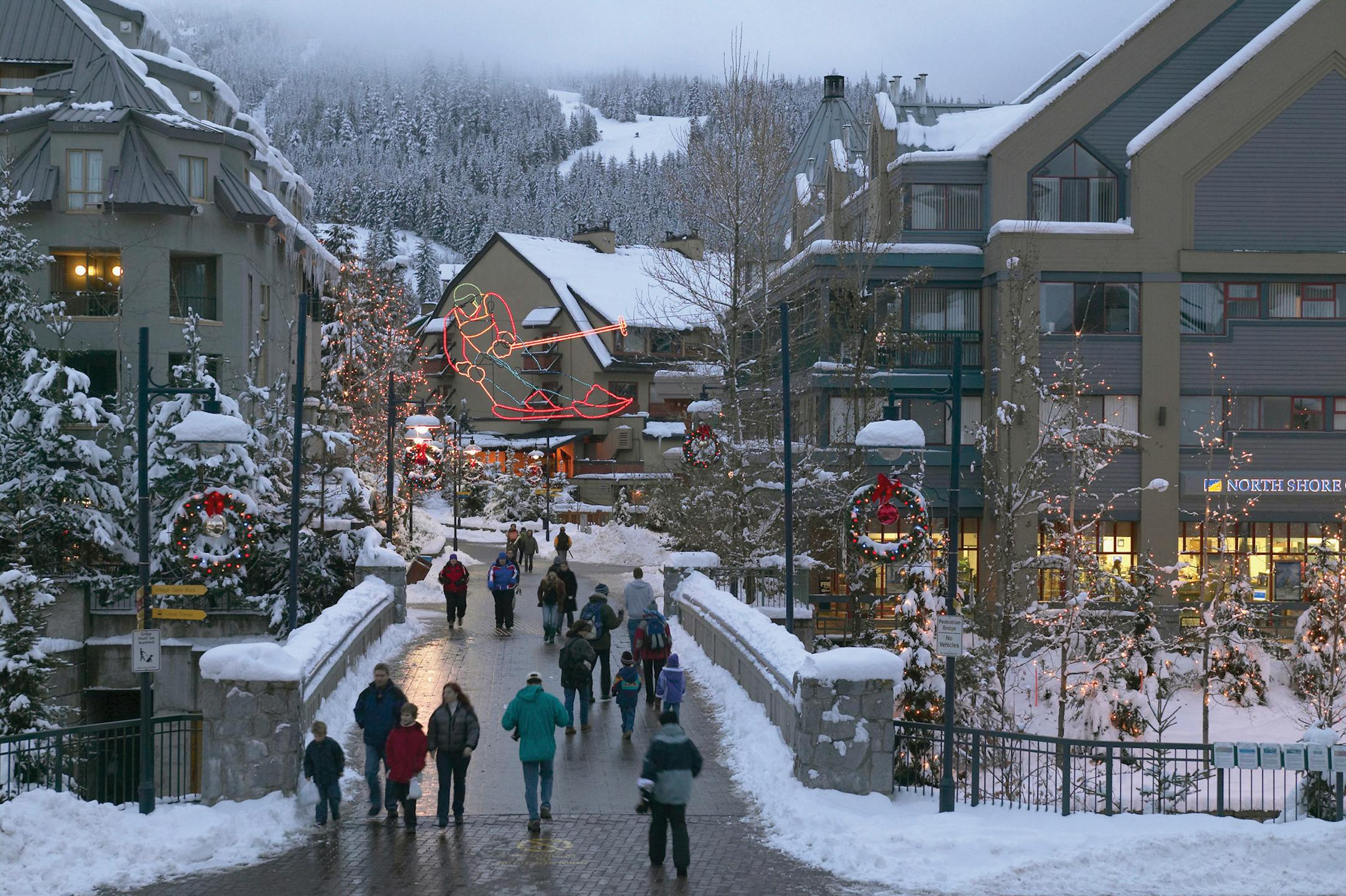 Winter shoppers take a break from the slopes in Whistler Village in Whistler, British Columbia.