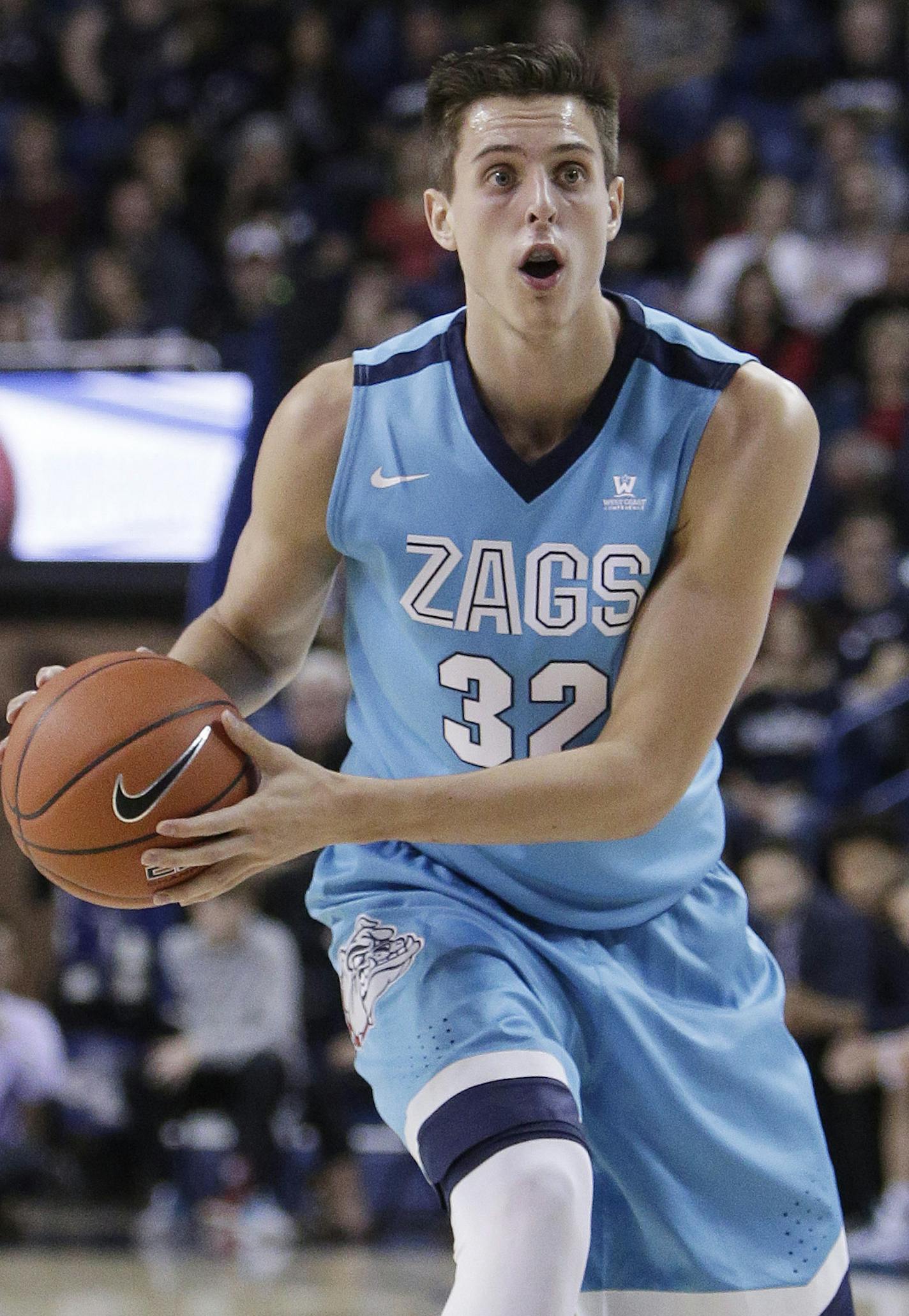 Gonzaga forward Zach Collins (32) looks to pass during the first half of an NCAA college basketball game against Bryant in Spokane, Wash., Friday, Nov. 18, 2016. (AP Photo/Young Kwak) ORG XMIT: OTK