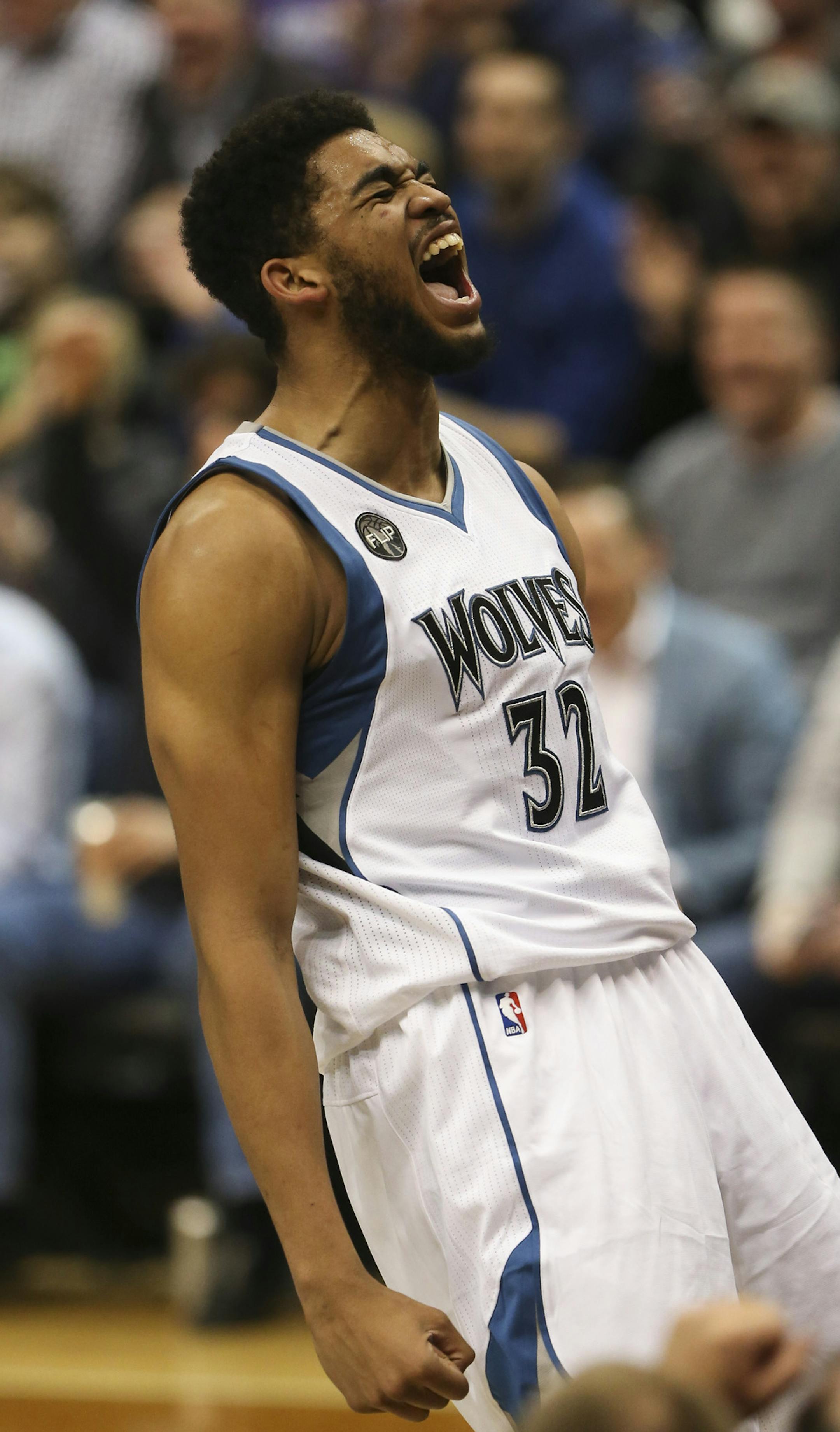 Timberwolves center Karl-Anthony Towns celebrated after a big third quarter dunk Wednesday night. He led the Wolves with 26 points. ] JEFF WHEELER ï jeff.wheeler@startribune.com The Minnesota Timberwolves beat the Sacramento Kings 113-104 in an NBA basketball game Wednesday night, March 23, 2016 at Target Center in Minneapolis. ORG XMIT: MIN1603232150419964