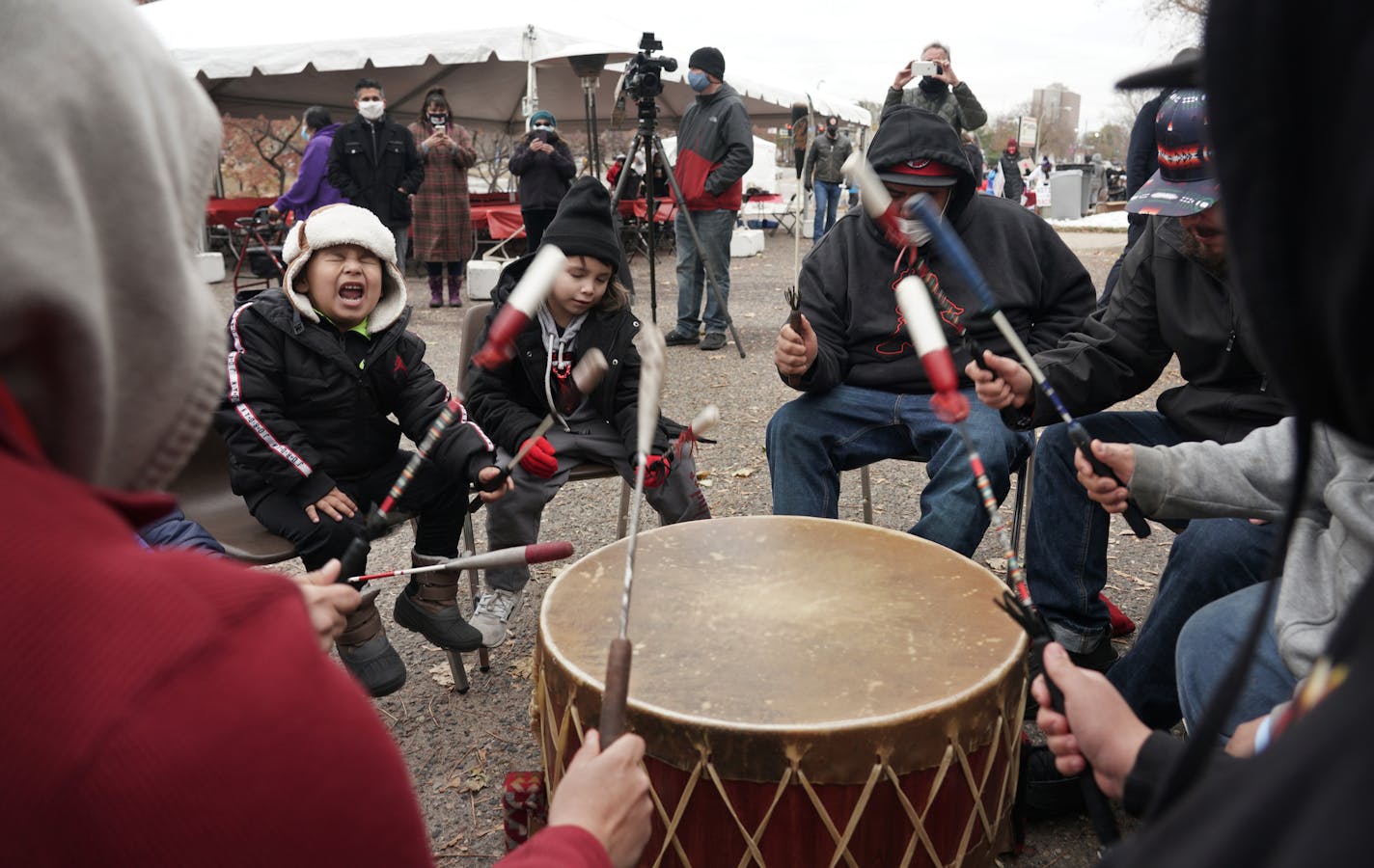 Drum group Hoka Hey performed a send-off song at an early voting event at American Indian OIC in Minneapolis before departing to early polling sites.