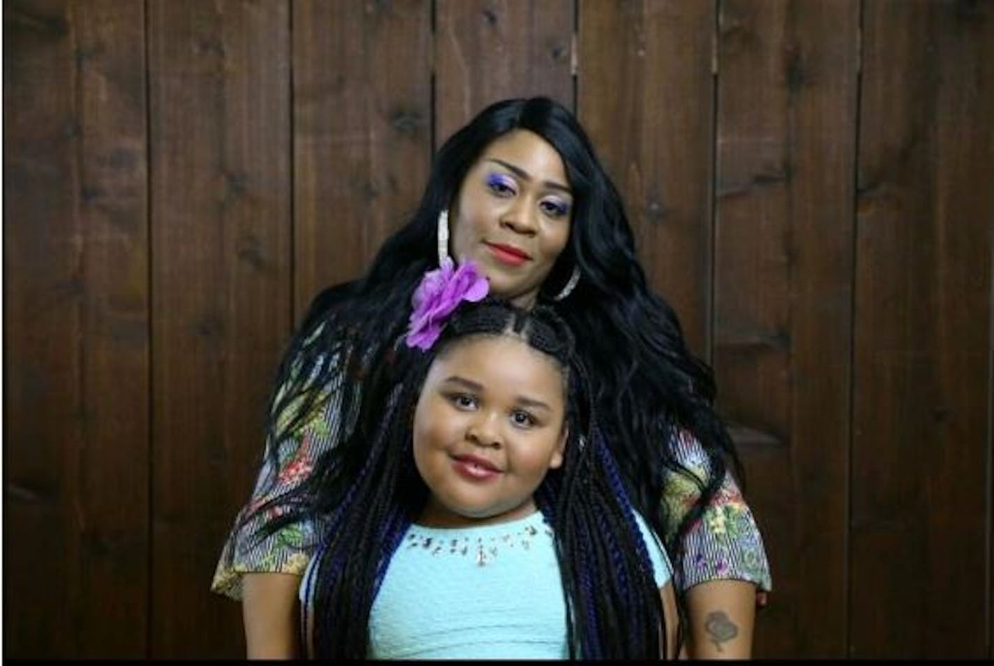 Essie McKenzie and her daughter Ty'Rah White. The 6-year-old died from severe burns after the van she and her sister were in caught fire in a Wal-Mart parking lot.