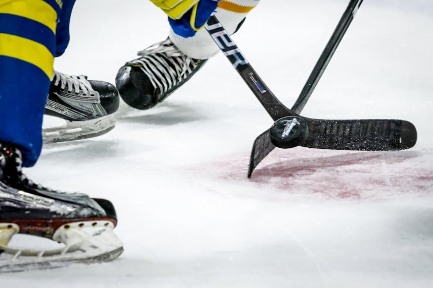 Puck drop in the last minute of the second period of the Minnesota Boy's State Hockey Tournament. Photo By: Matt Weber