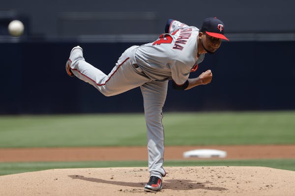Ervin Santana threw a four-hitter to carry the Twins past the Padres 5-2 on Wednesday. He even drove in two runs.