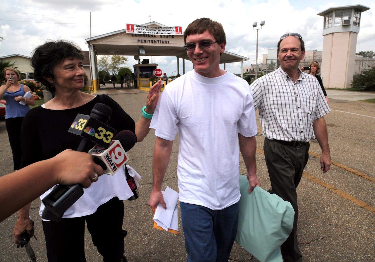 Damon Thibodeaux upon his release from prison with Minneapolis lawyers Steve Kaplan and Denise LeBoeuf. Photo by Calhoun McCormick.