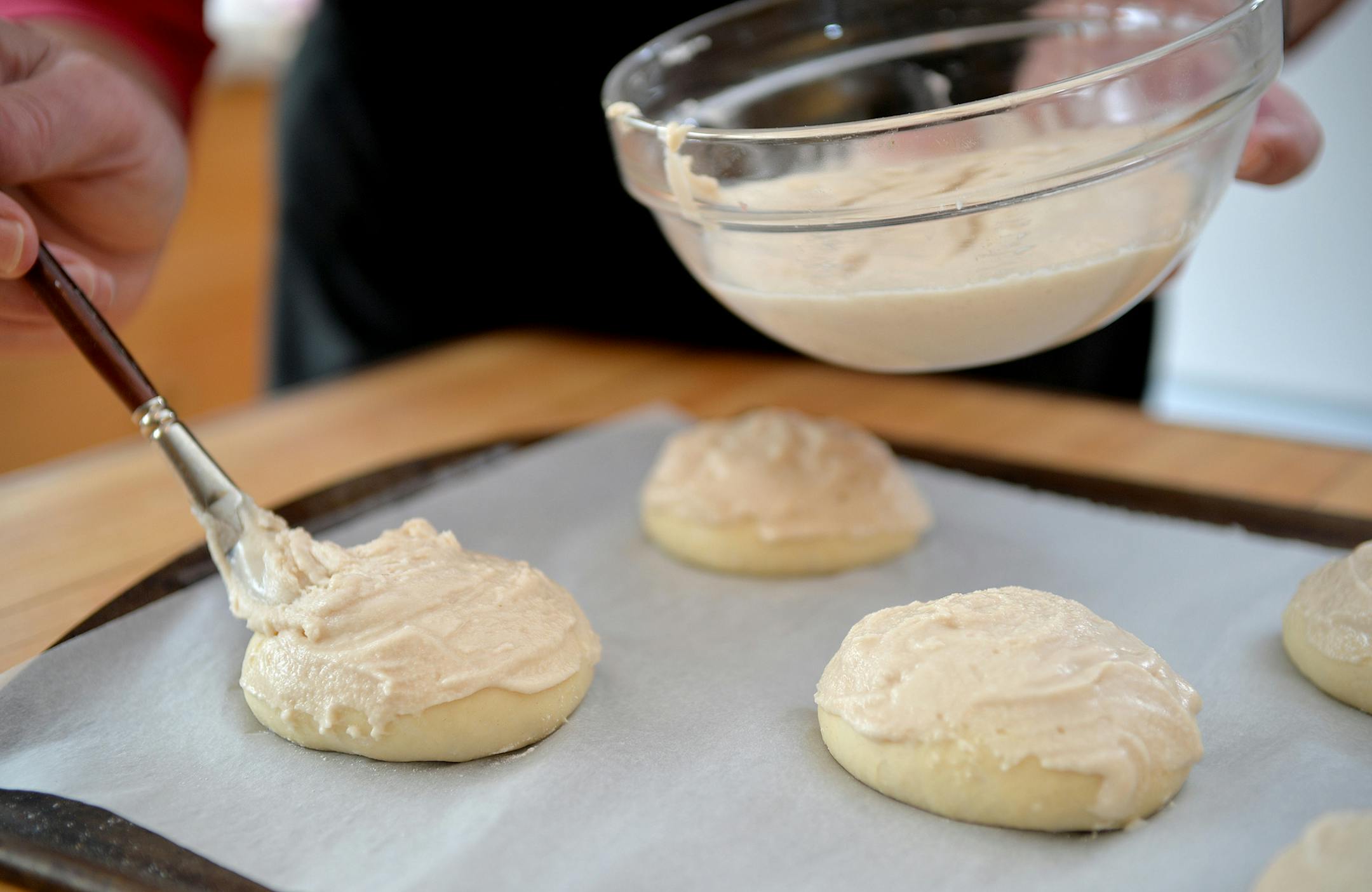 Paint on an ample amount of topping before baking. ] (SPECIAL TO THE STAR TRIBUNE/BRE McGEE)